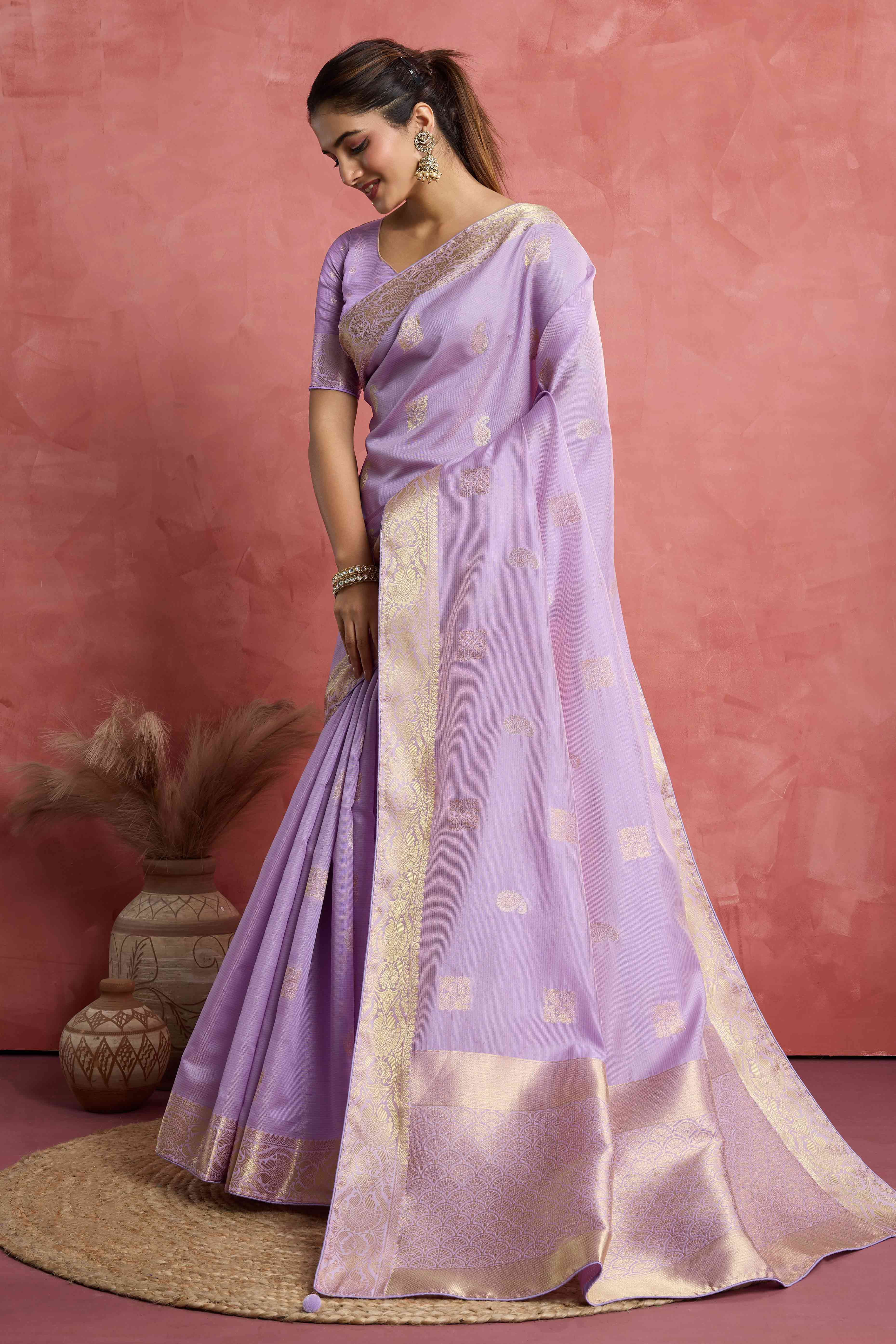 Contemporary Lavender Silk Blend Saree Flaunting Alternate Buttas With Piping & Tassel Accents