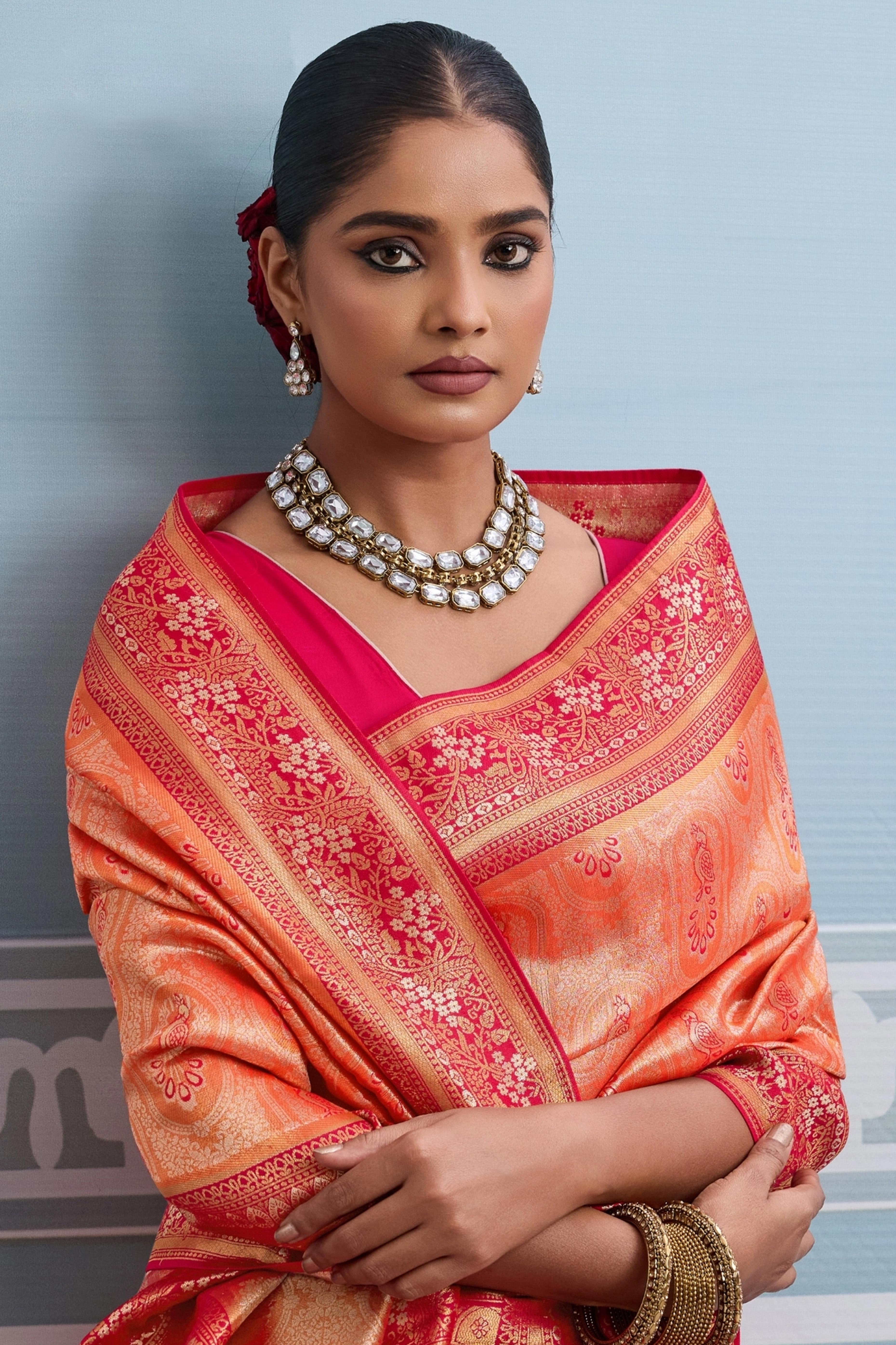 Orange Kanjivaram Silk Saree Accented with Traditional Zari Work