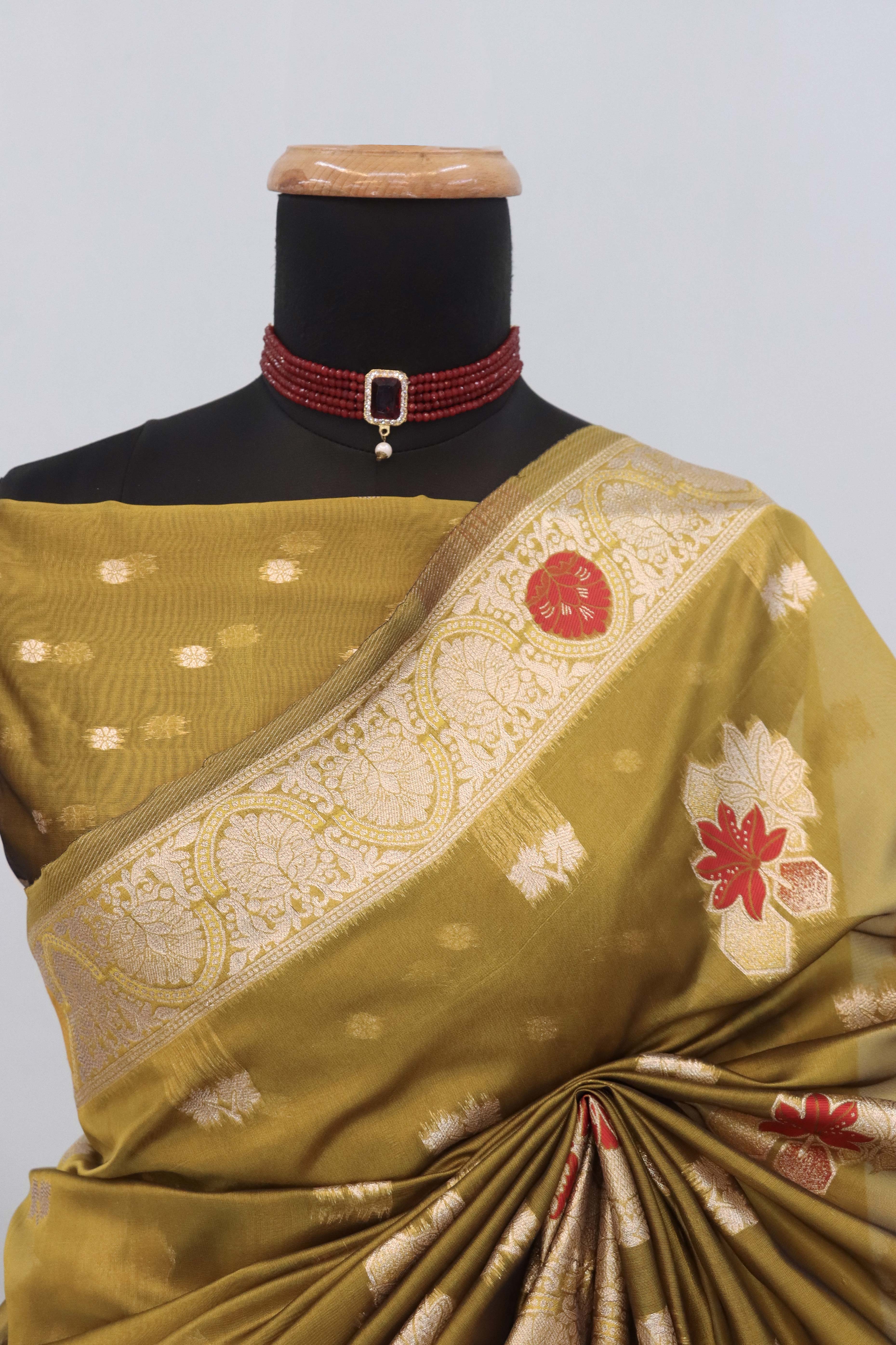 Charming Mehendi Green Zari Woven Floral Organza Saree Accented With Digital Printed Pallu & Latkan