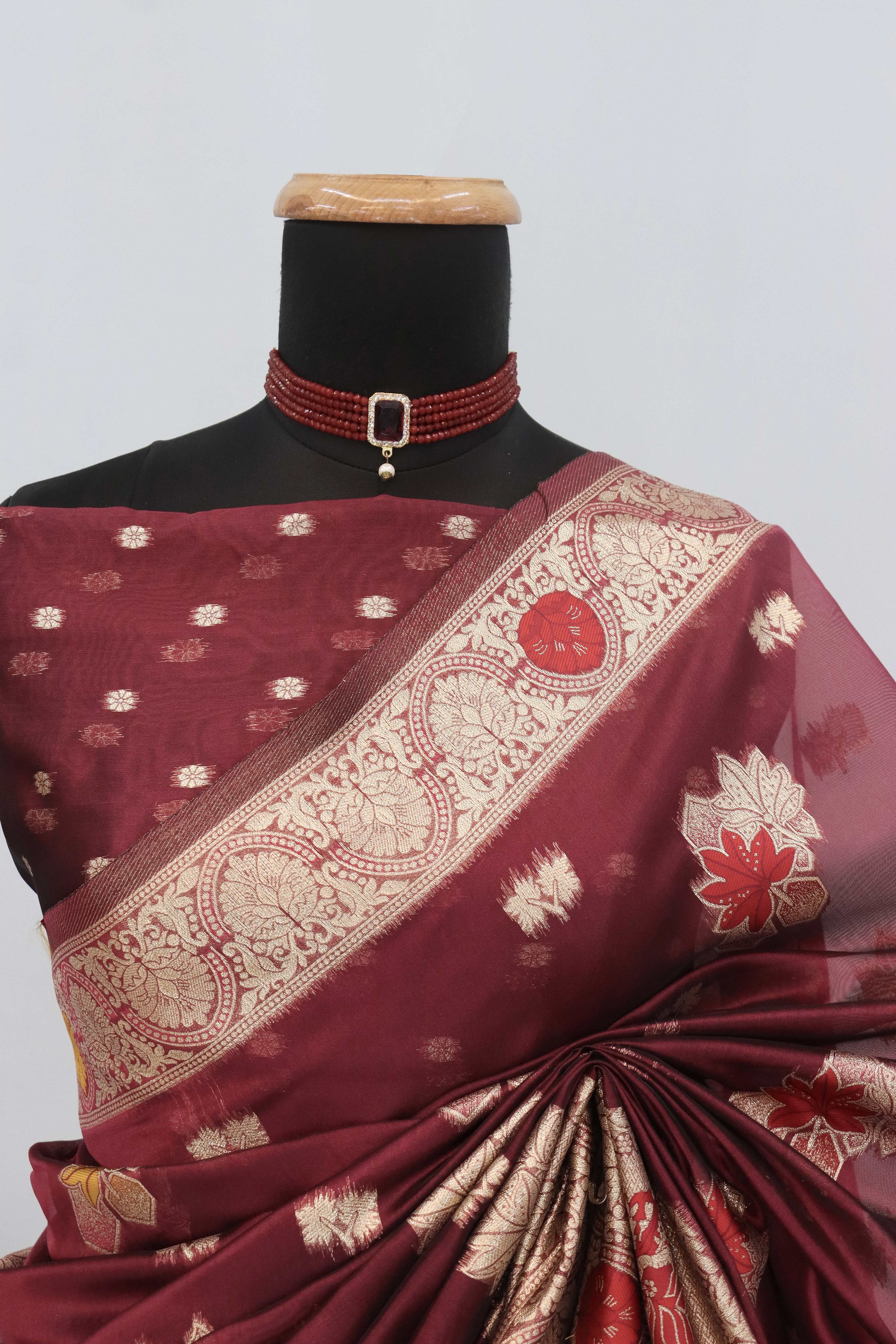 Charming Burgundy Zari Woven Floral Organza Saree Accented With Digital Printed Pallu & Latkan