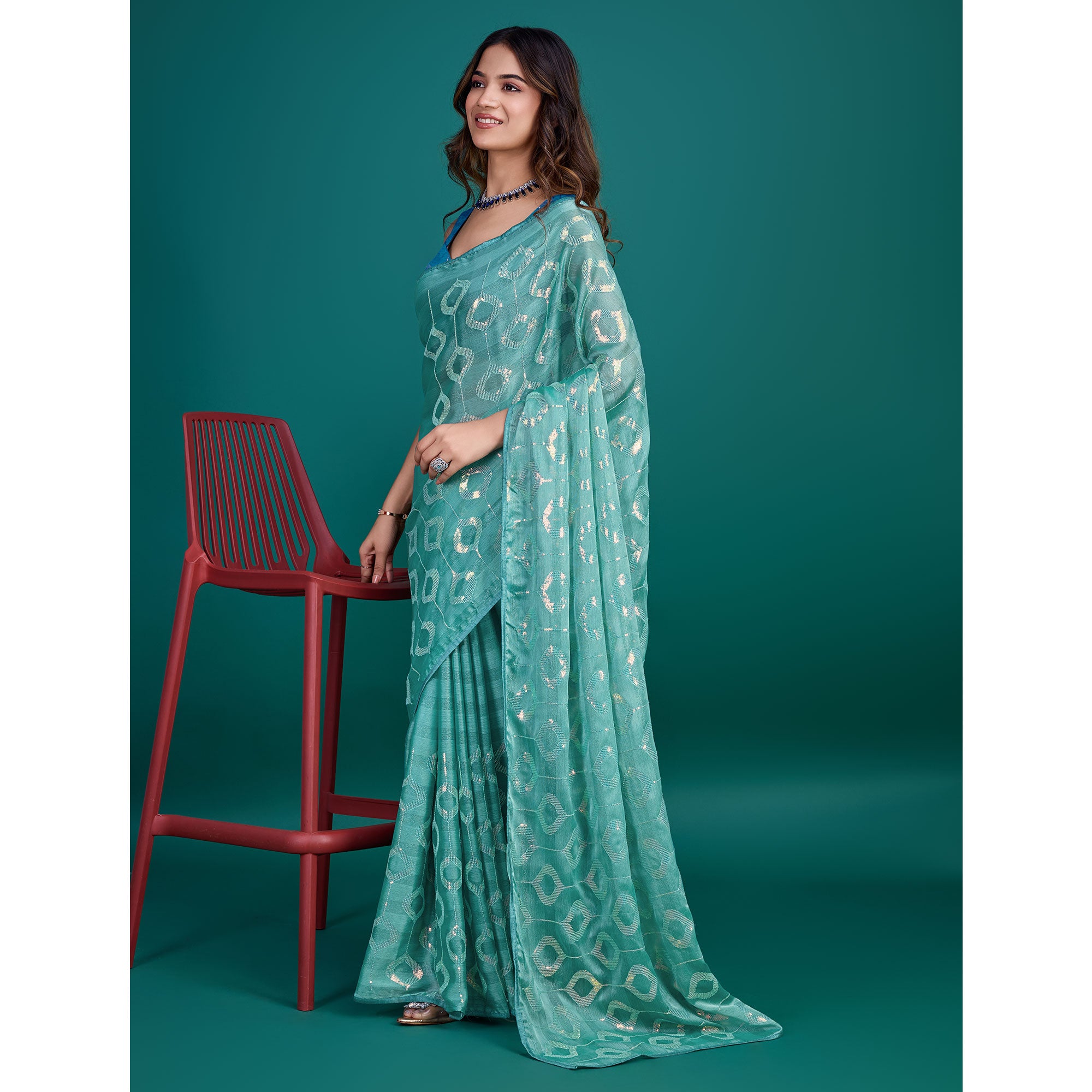 Turquoise Sequin Embroidered Georgette Saree