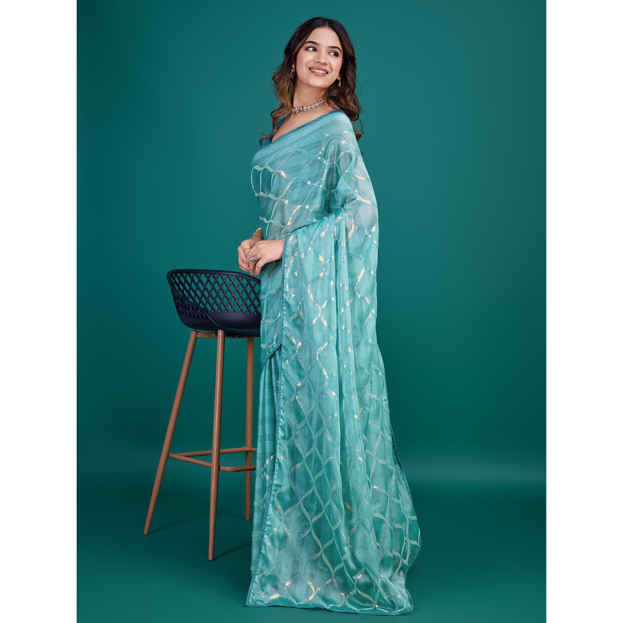 Turquoise Sequins Embroidered Georgette Saree