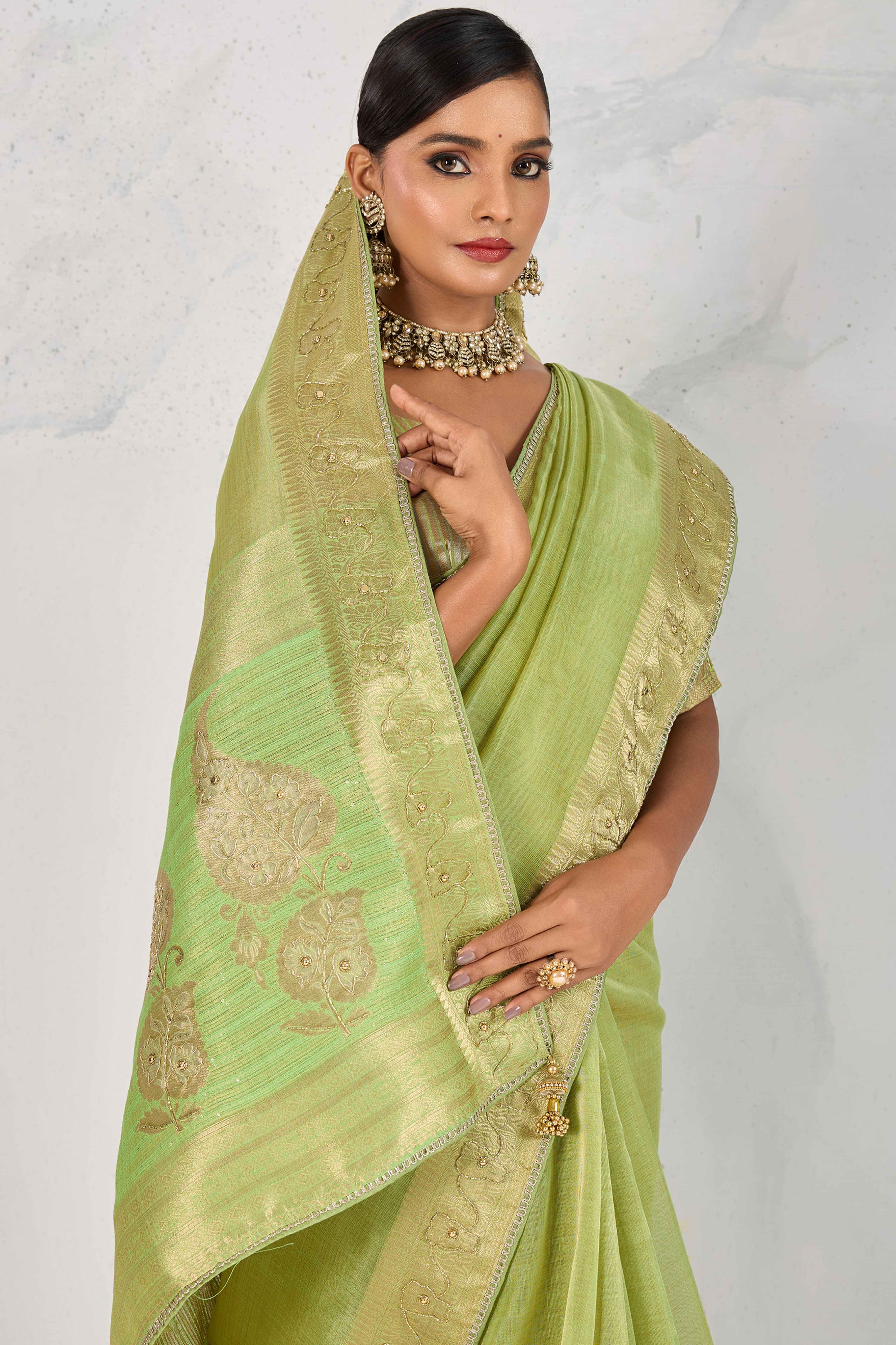 Green Tissue Linen Saree Adorned With Intricate Zardosi & Pearl Cutdana Hand Embroidery
