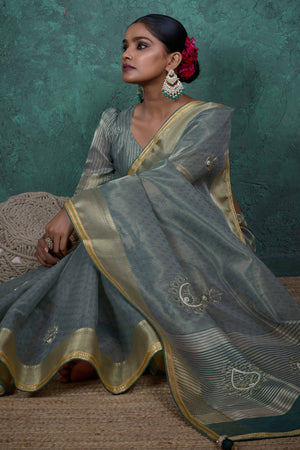 Greyish Green Woven Linen Tissue Saree Featuring Beads Embellishment