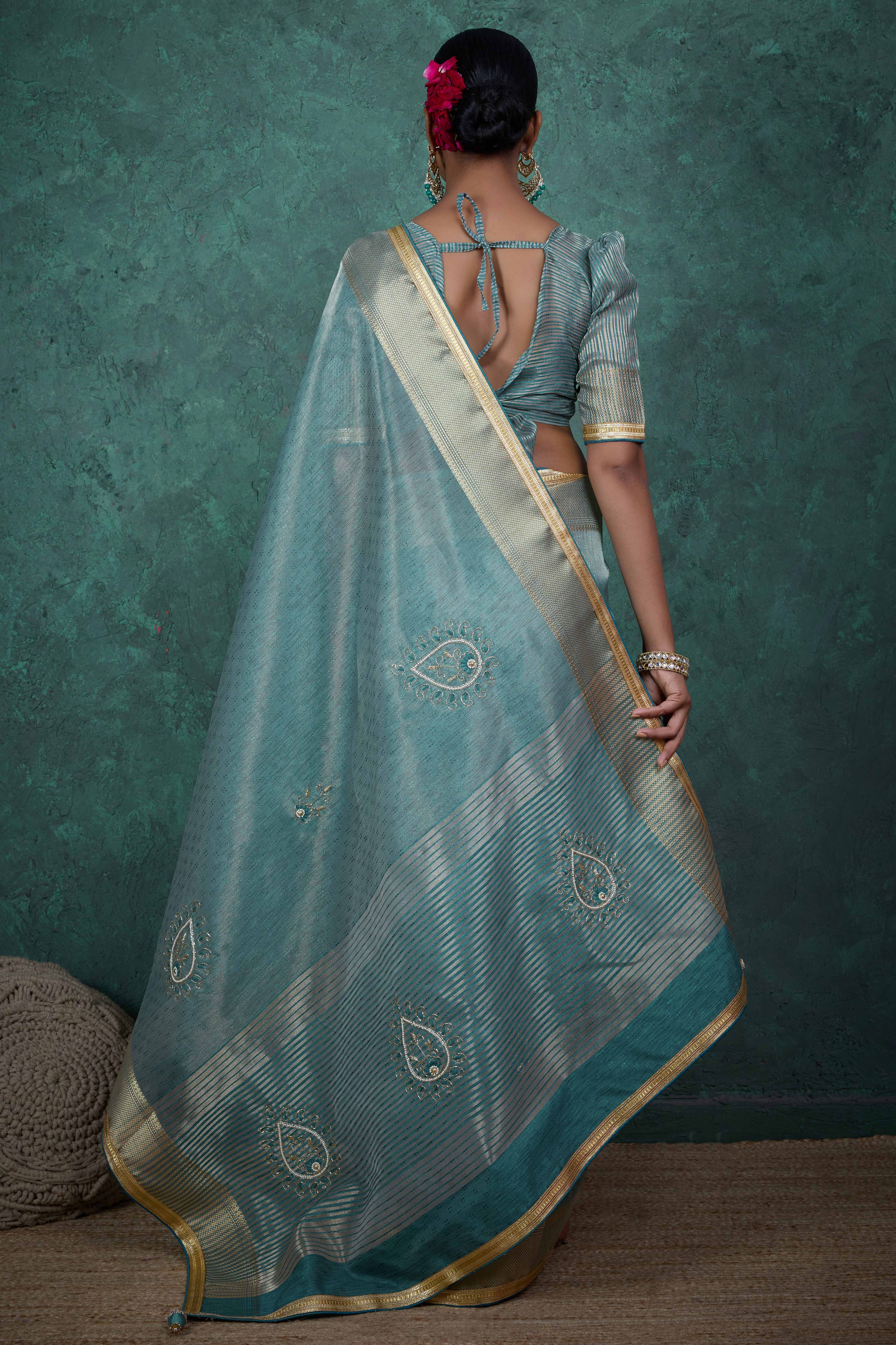 Teal Woven Linen Tissue Saree Featuring Beads Embellishment