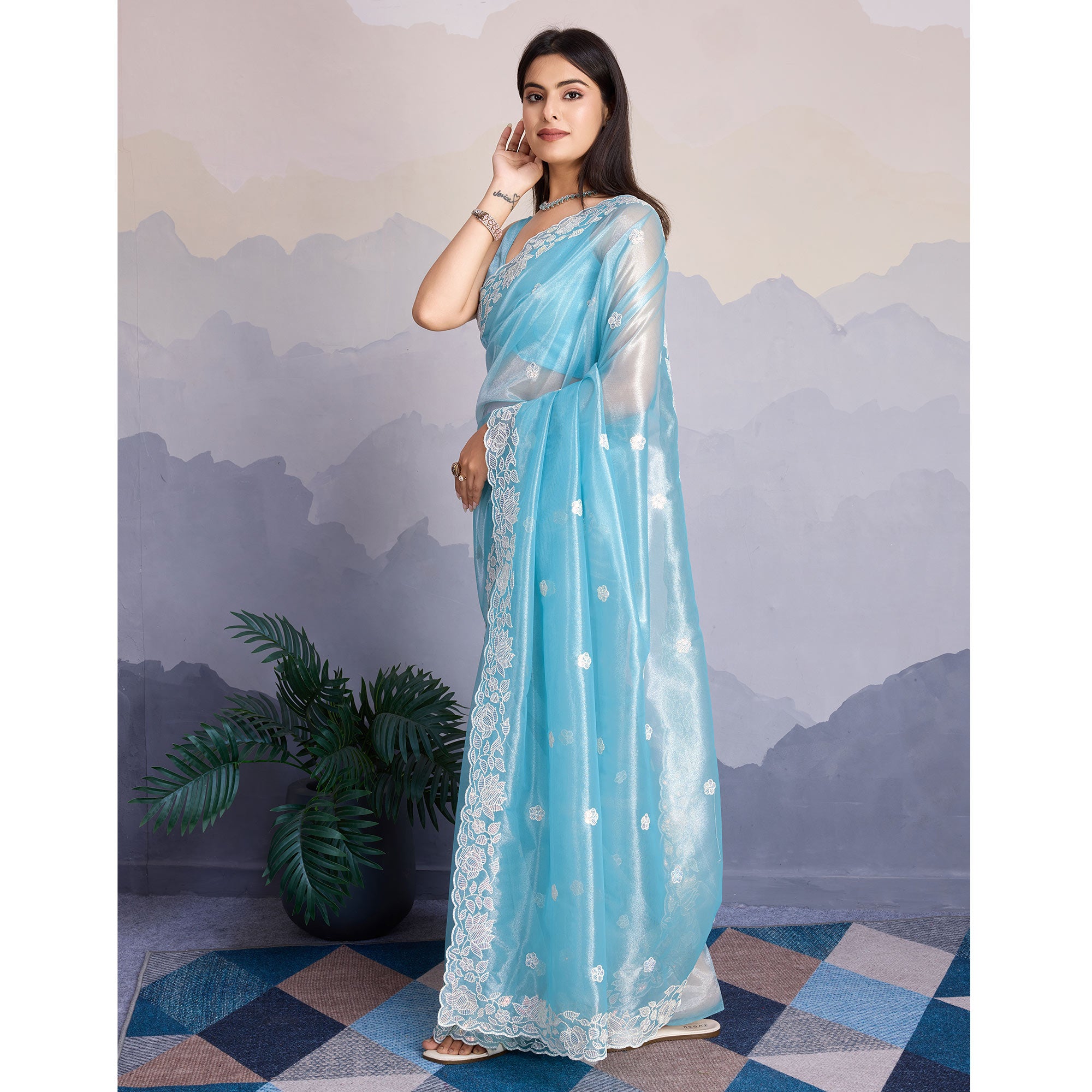 Blue Floral Sequins Embroidered Twill Net Saree