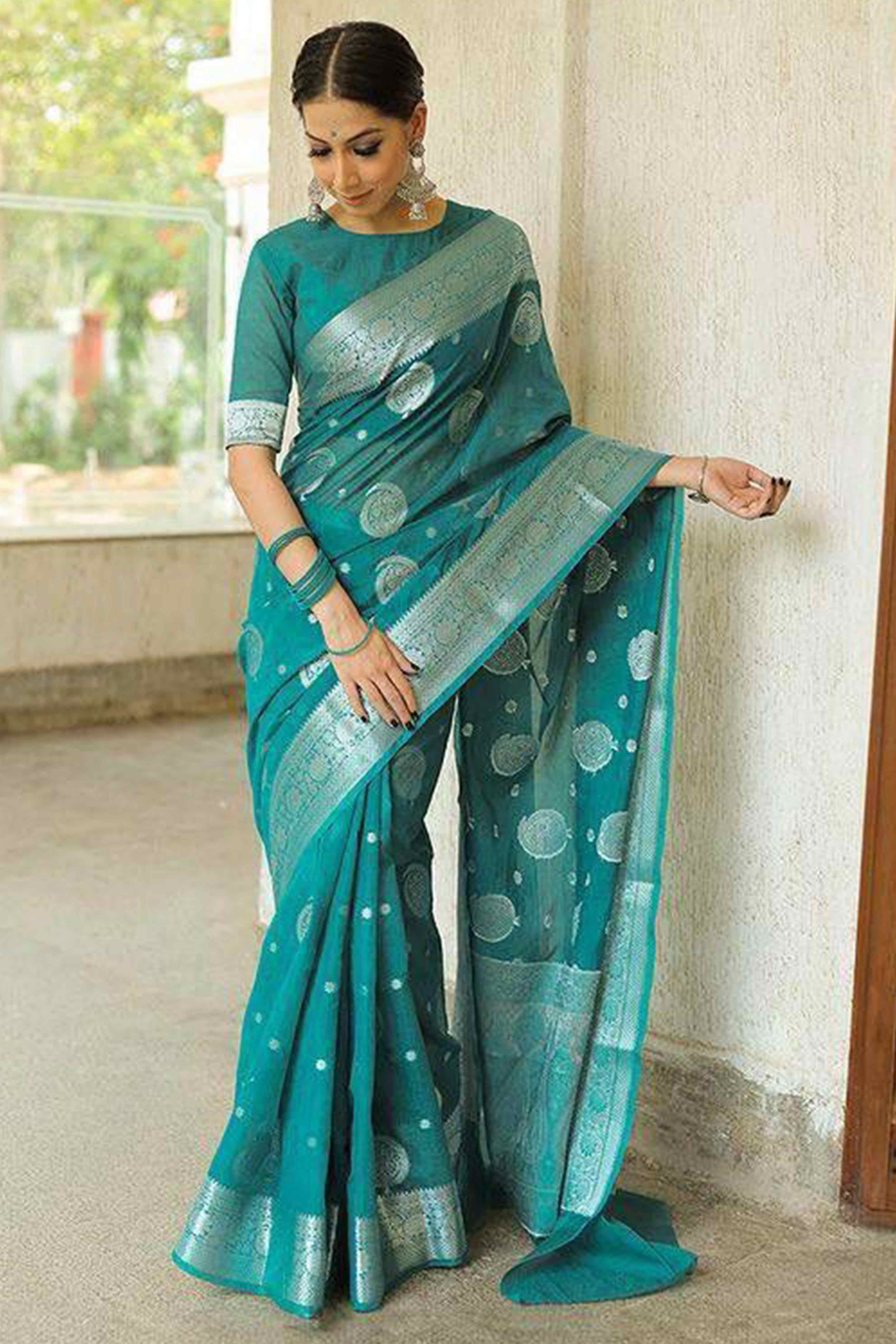 Elegant Teal Floral Zari Woven Lichi Banarasi Silk Saree With Rich Detailing
