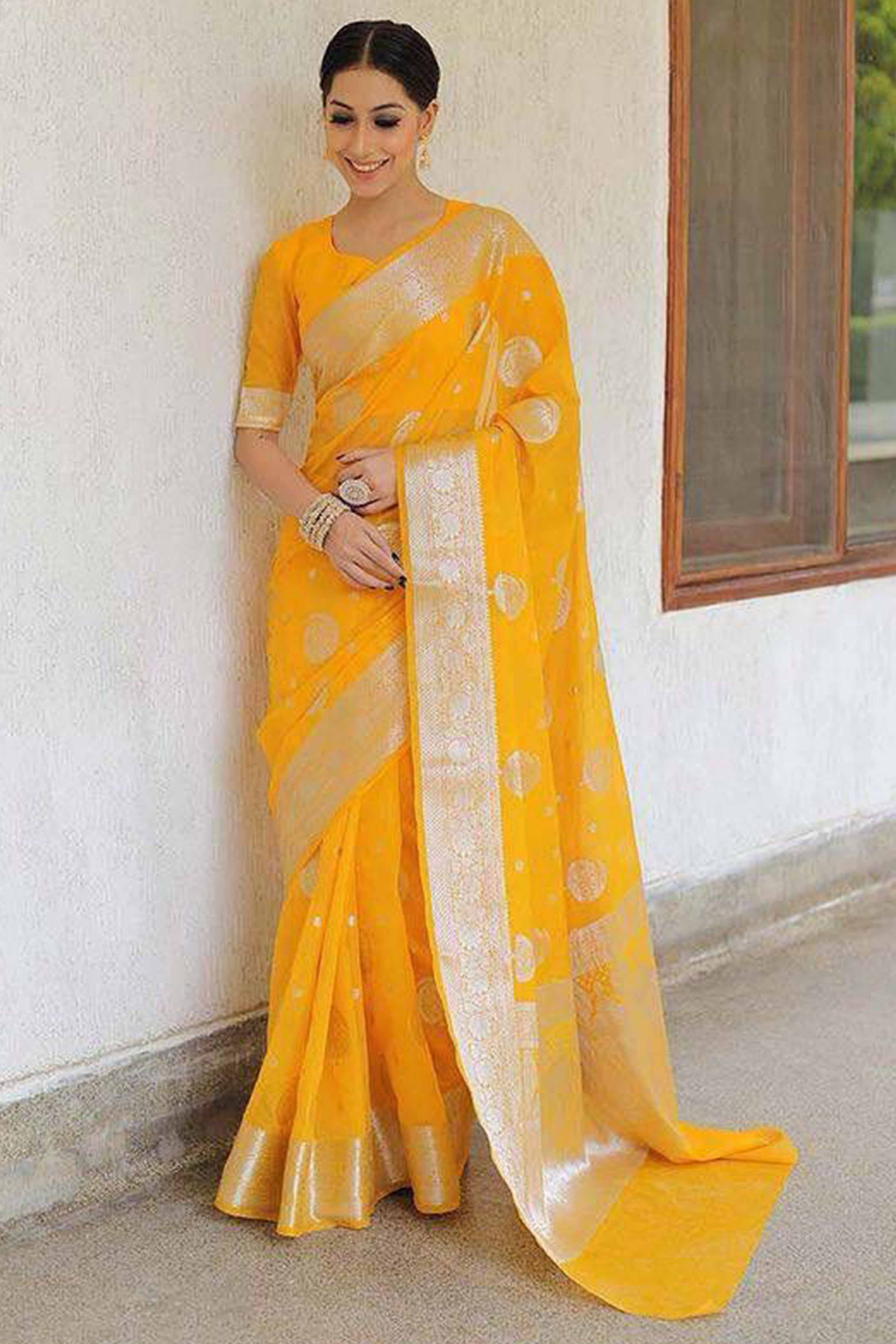 Vibrant Yellow Floral Zari Woven Lichi Banarasi Silk Saree With Rich Detailing