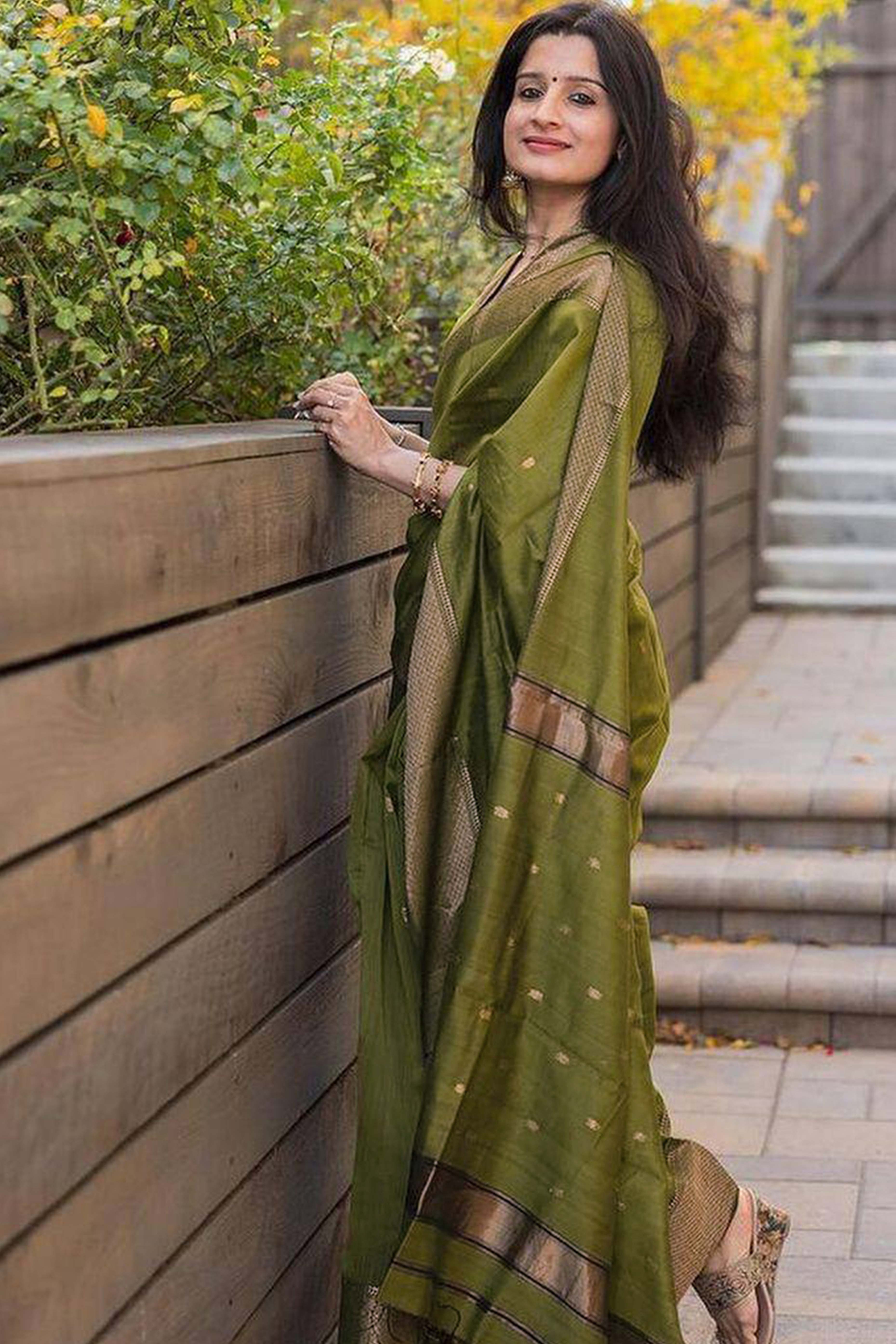 Exquisite Mehendi Green Floral Zari Woven Lichi Banarasi Silk Saree