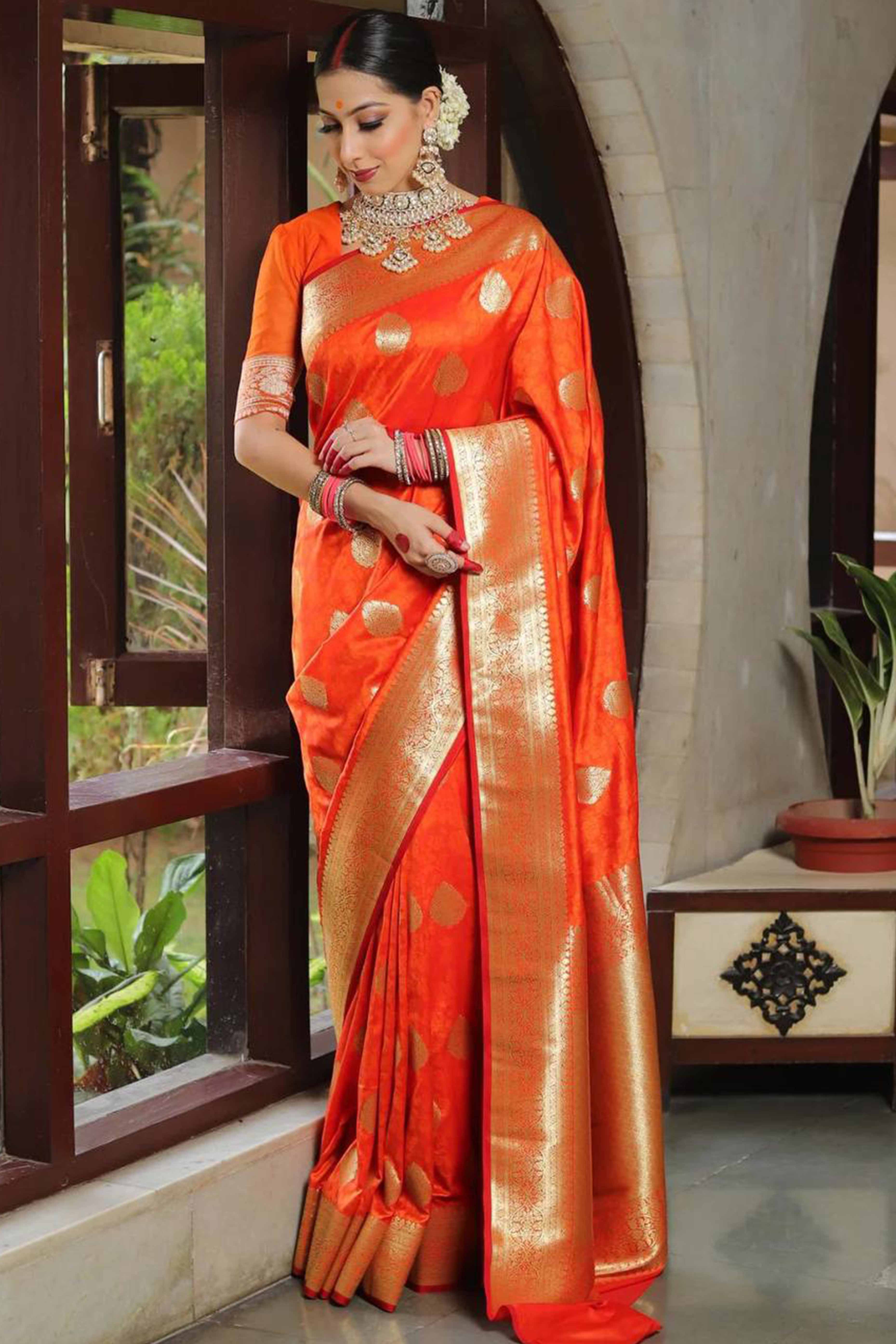 Orange Floral Woven Lichi Banarasi Silk Saree