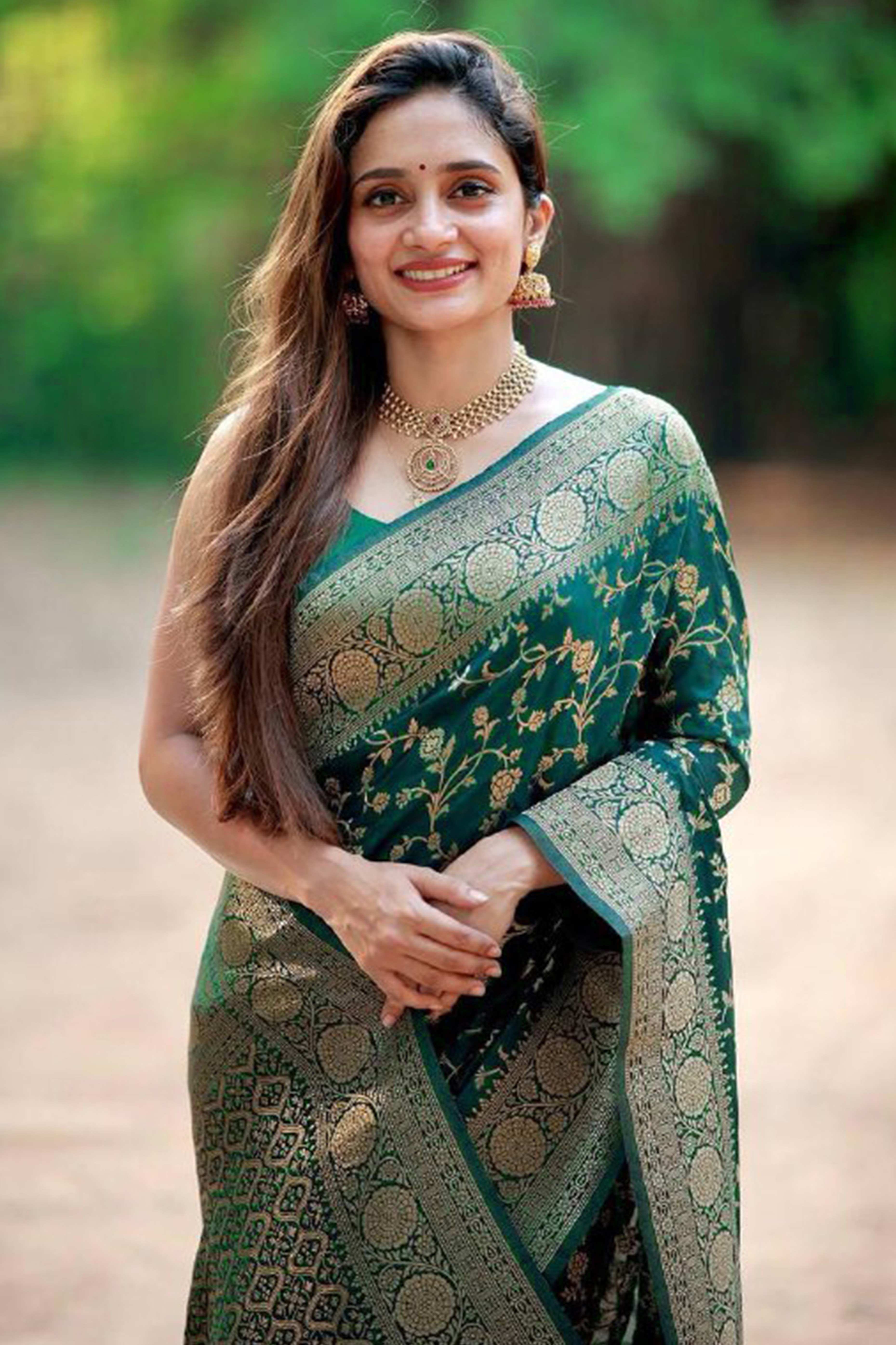 Green Saree in Pure Banarasi Silk with Artistically Woven Floral Zari Accents