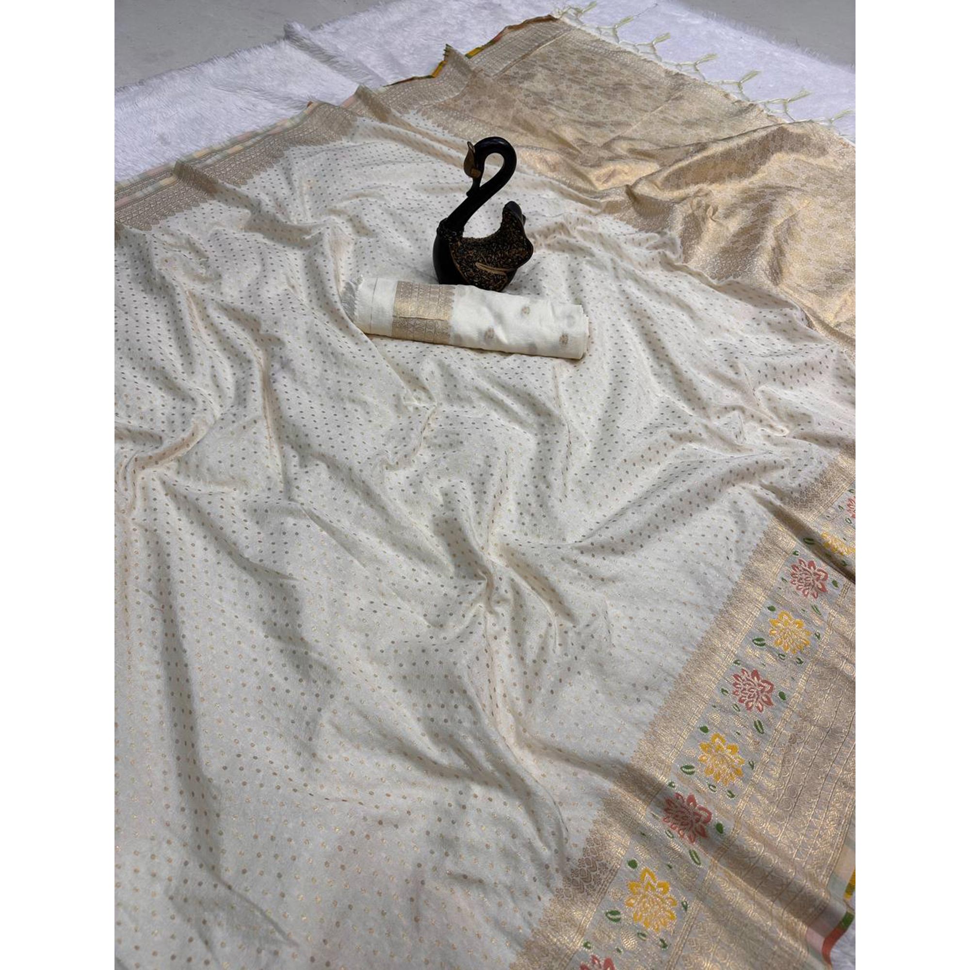 Off White Saree in Pure Georgette Featuring Delicate Zari Butti Work