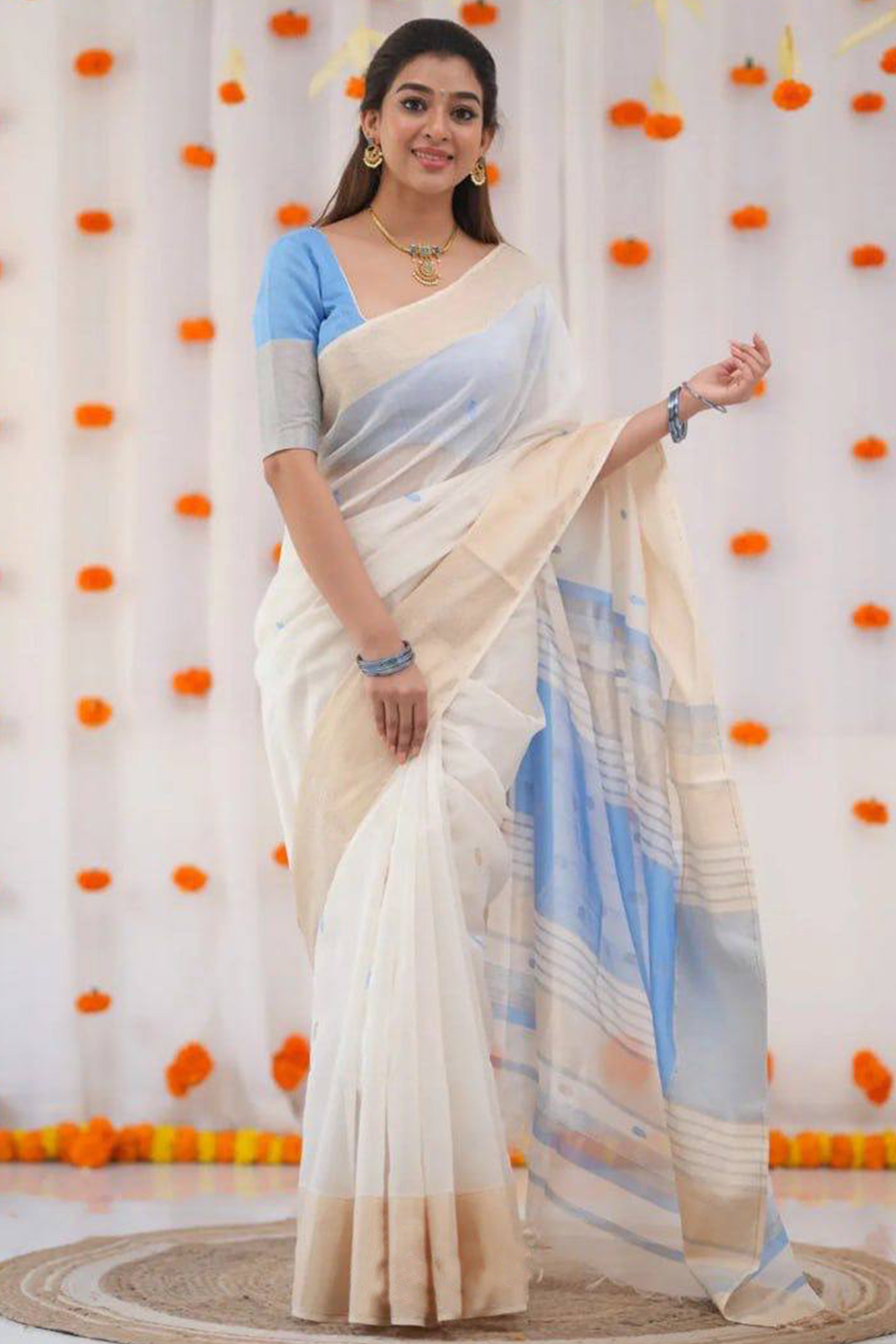 White and Blue Zari-Woven Linen Cotton Saree Offering a Refined Festive Look