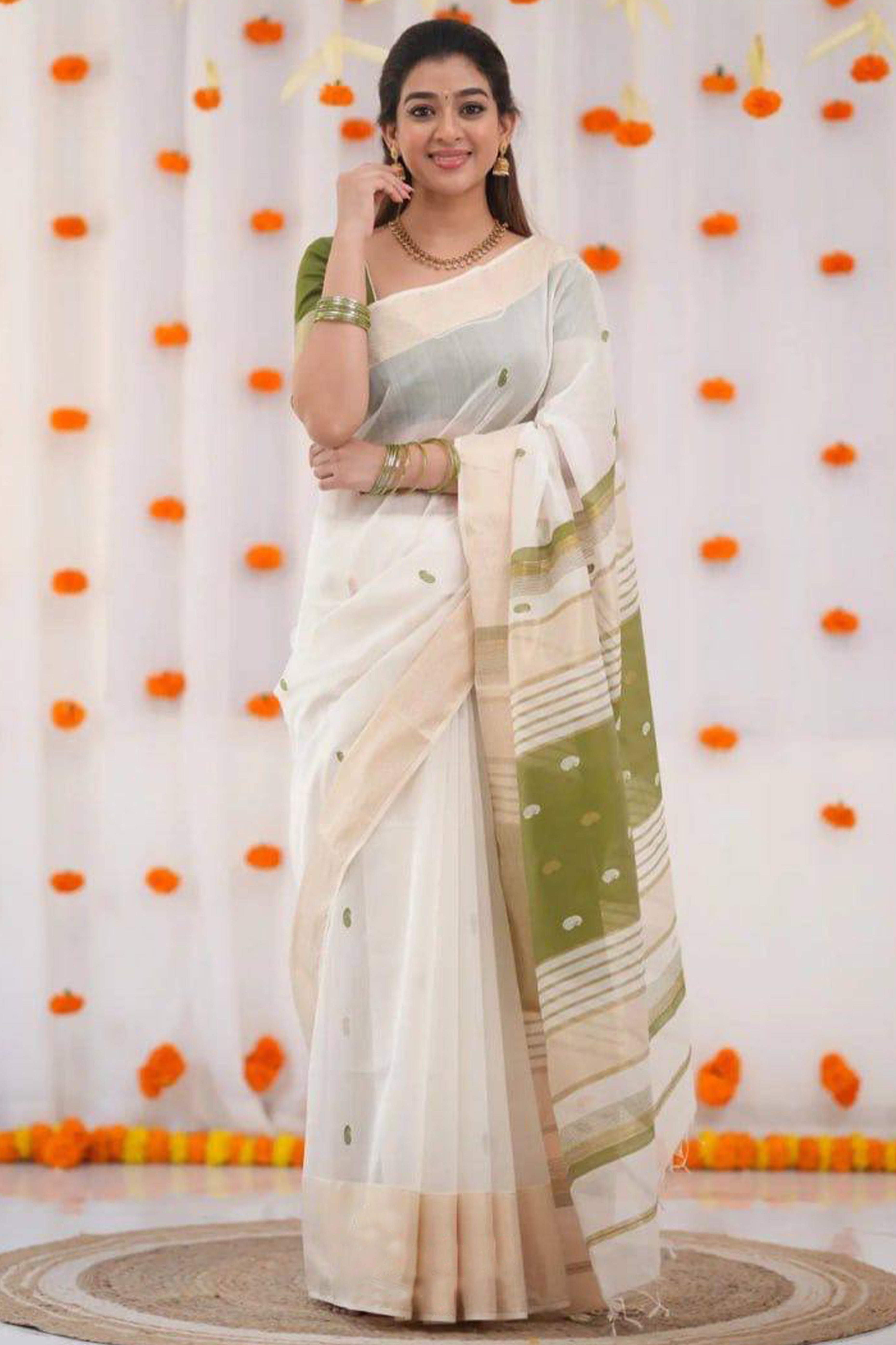 White and Green Zari-Woven Linen Cotton Saree Offering a Refined Festive Look