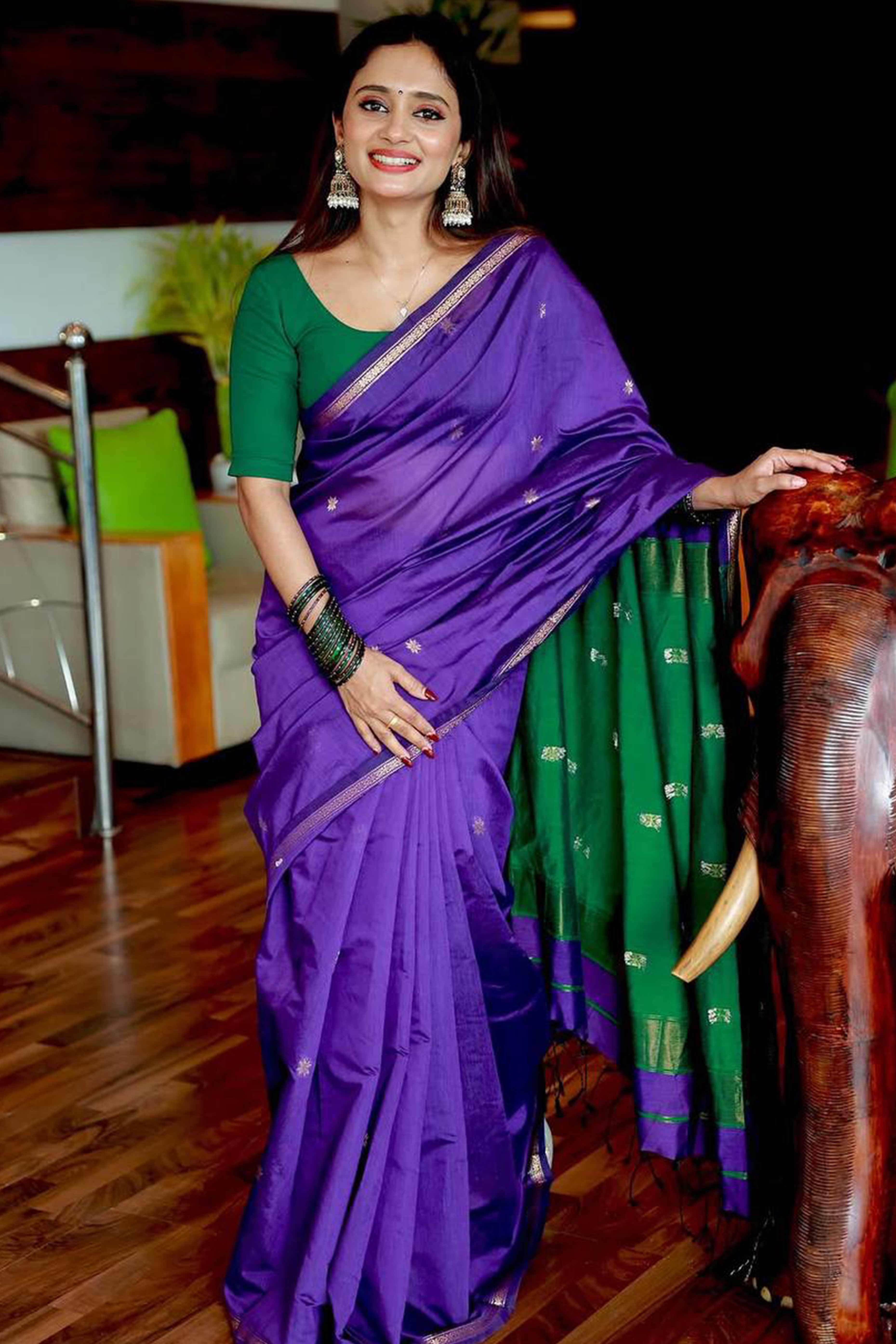 Purple Linen Cotton Saree Adorned with Intricate Zari Butti Weaving for a Refined Ethnic Appeal