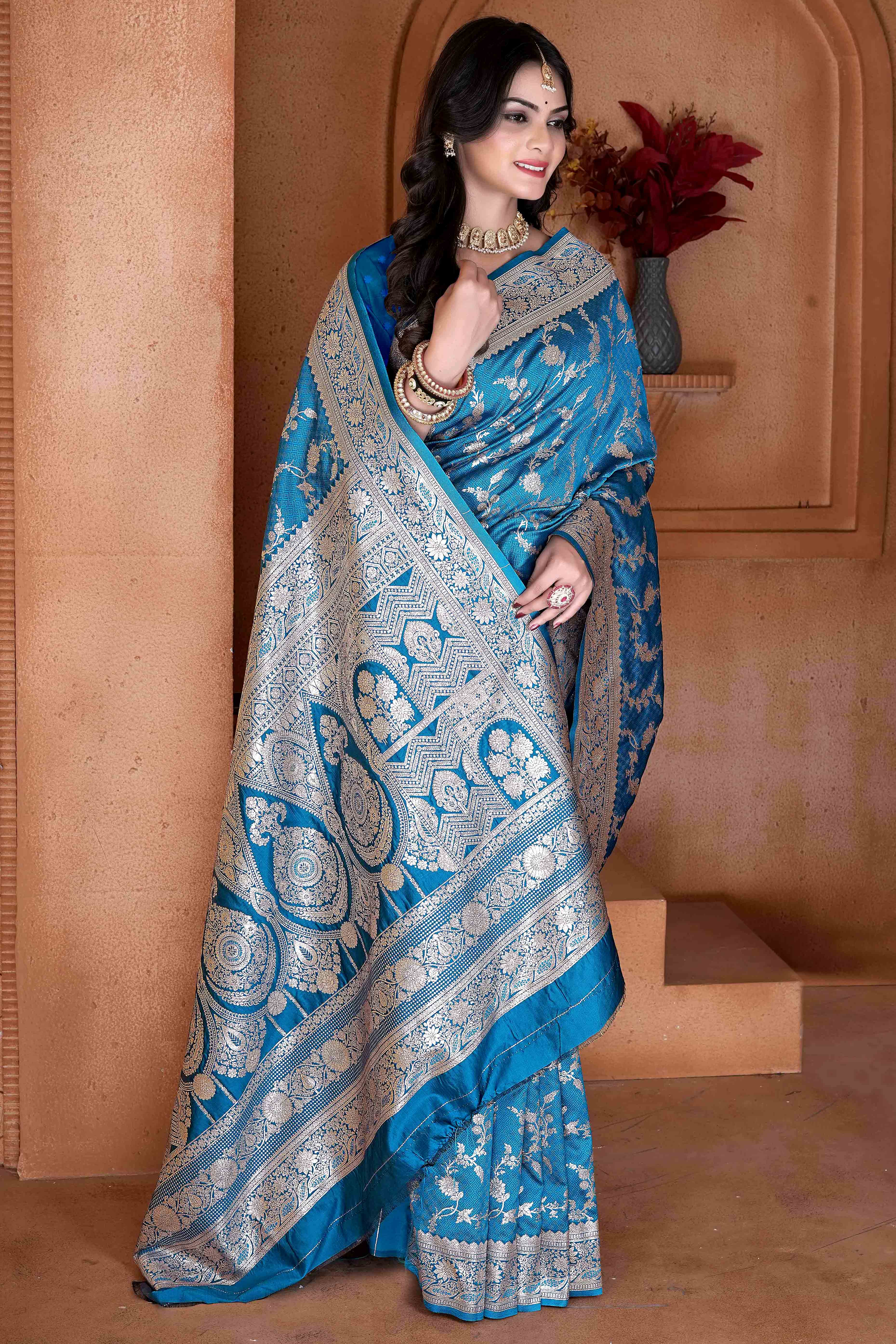 Blue Saree in Art Silk Featuring Traditional Zari Woven Floral Motifs for Special Occasions