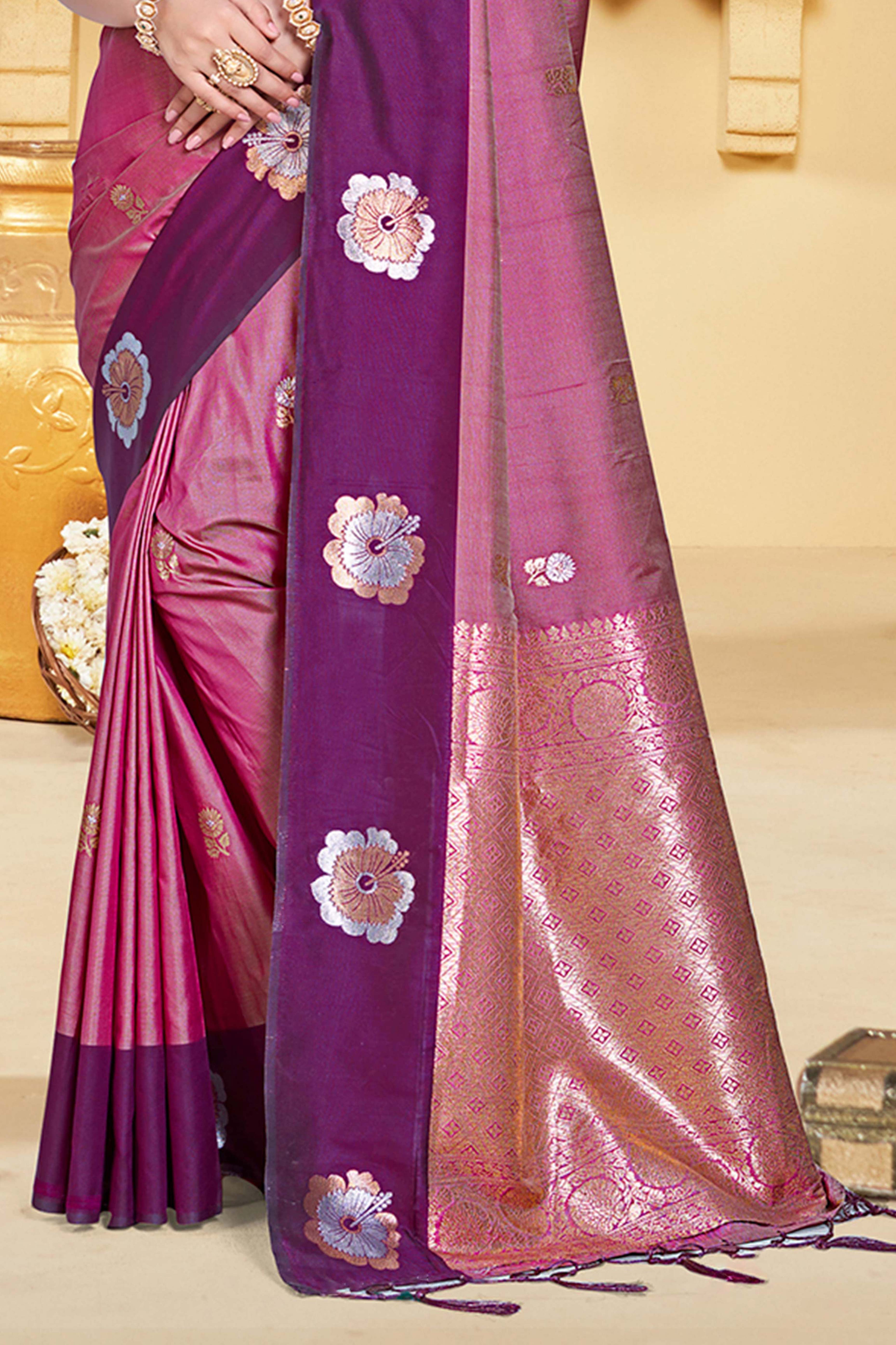 Charming Pink & Purple Floral Zari Weaving Silk Blend Saree Enhanced With Stylish Tassel Pallu