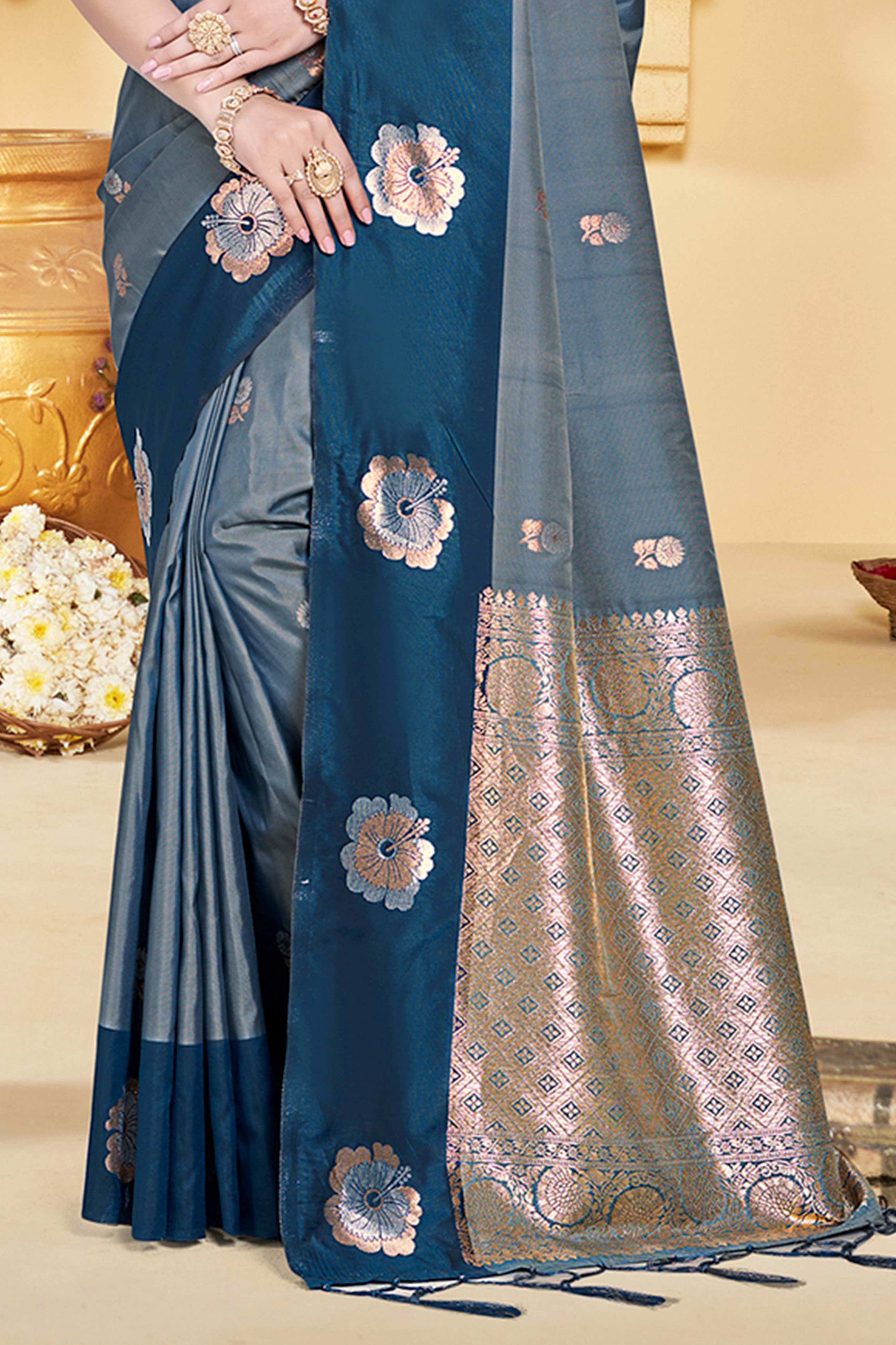 Charming Morpich Blue Floral Zari Weaving Silk Blend Saree Enhanced With Stylish Tassel Pallu