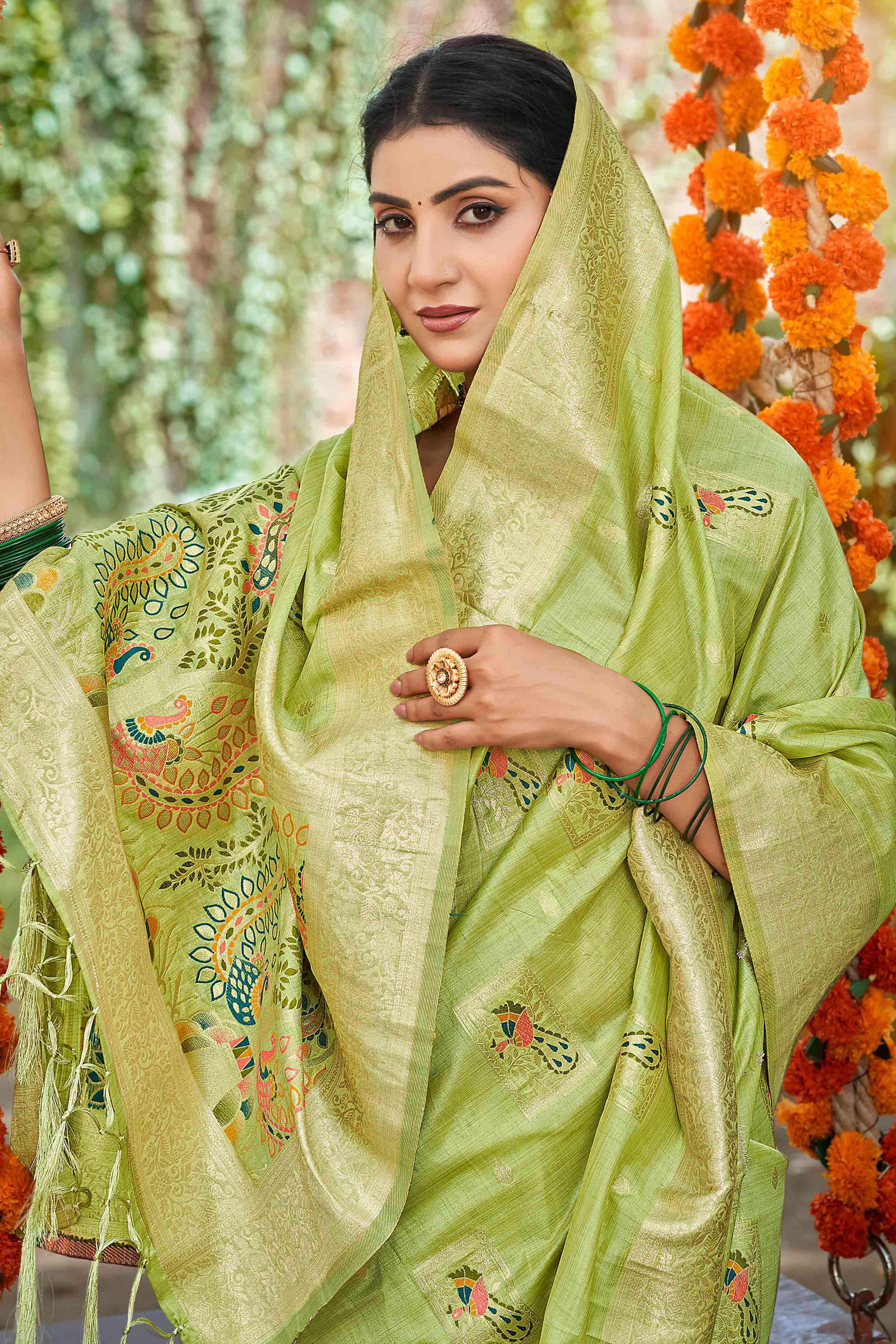 Green Floral & Peacock Motif Zari Woven Assam Silk Blend Saree With Graceful Tassel Pallu