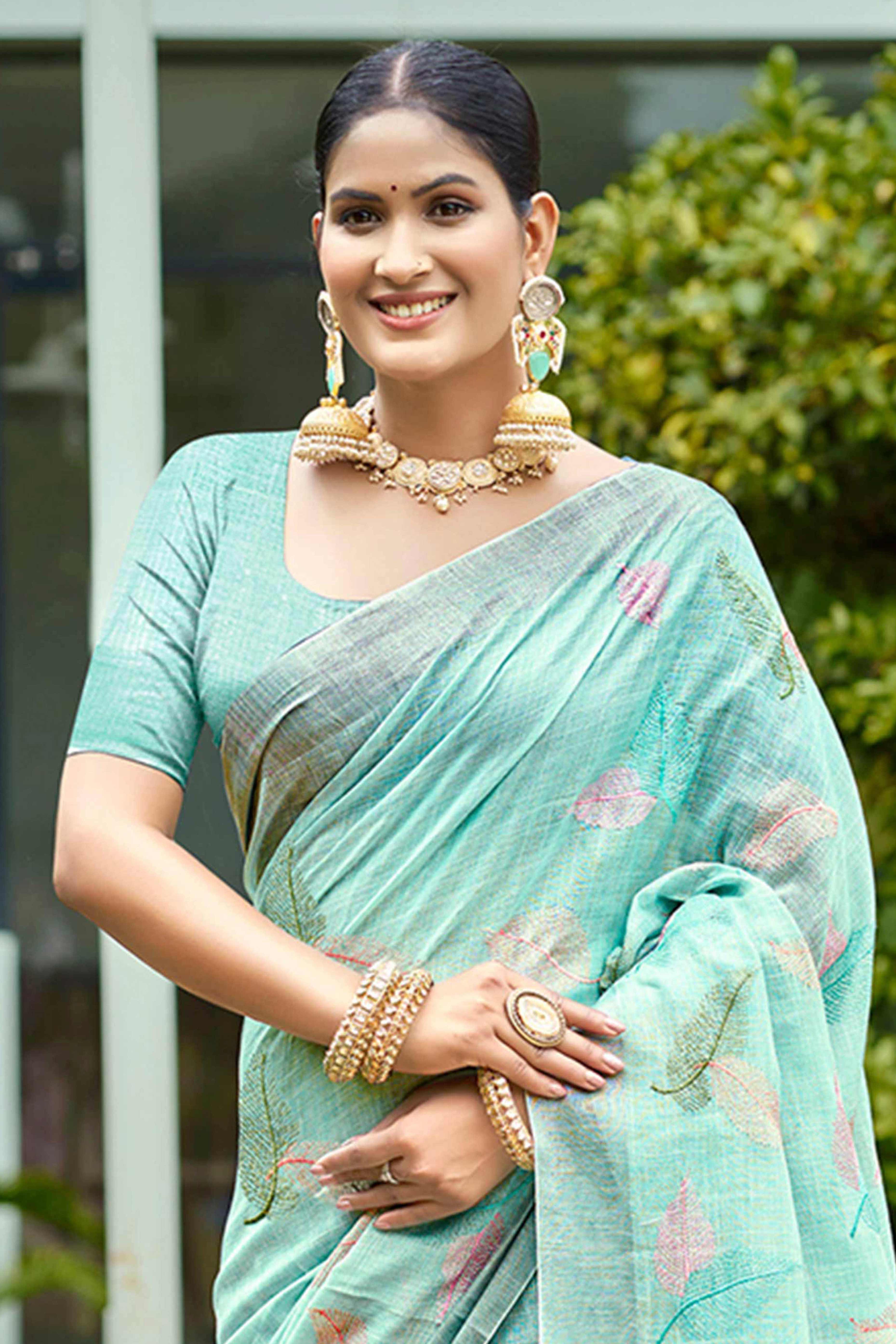 Exquisite Turquoise Leaf Motif Thread Embroidered Linen Saree With Elegant Weaving Border
