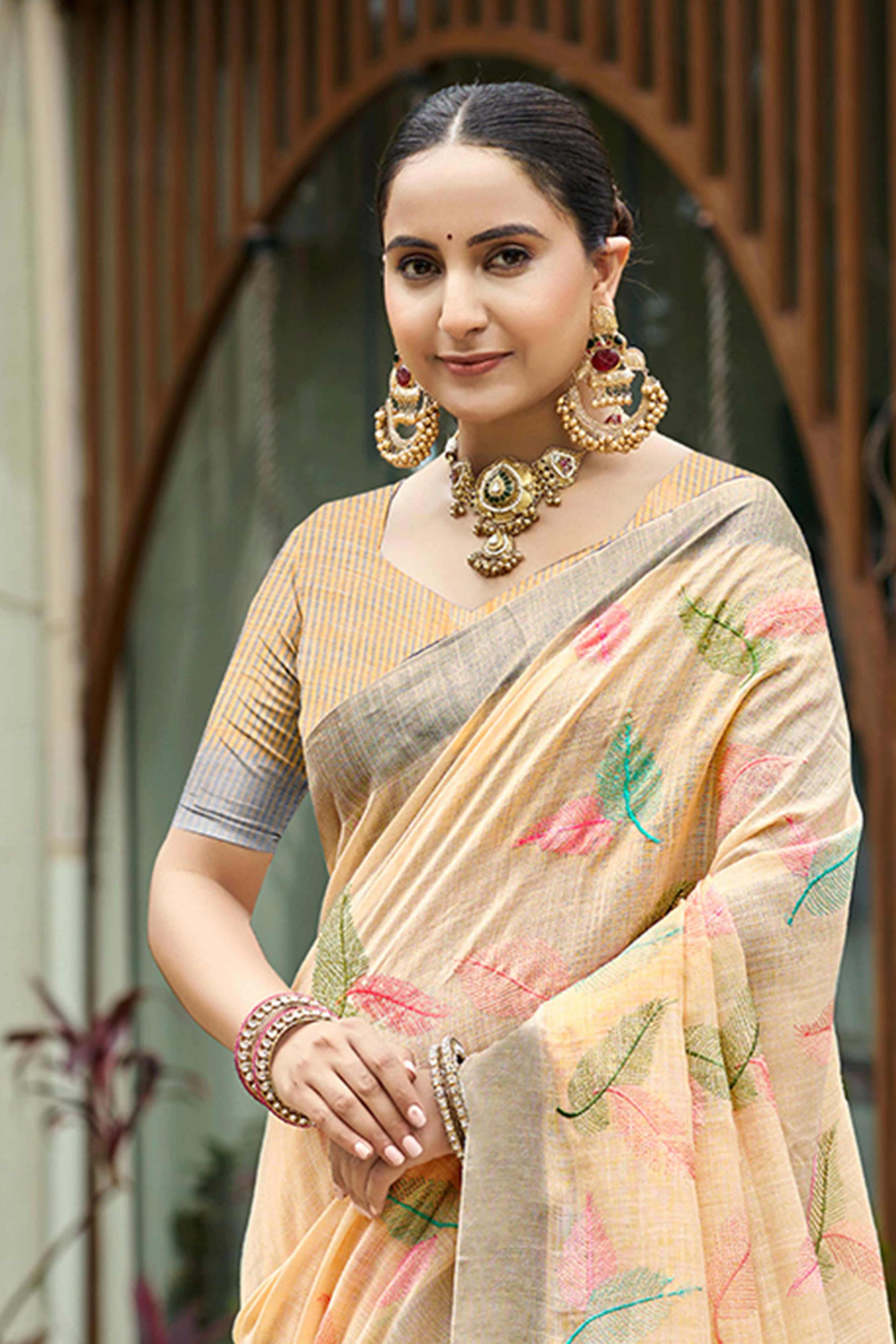 Exquisite Light Peach Leaf Motif Thread Embroidered Linen Saree With Elegant Weaving Border