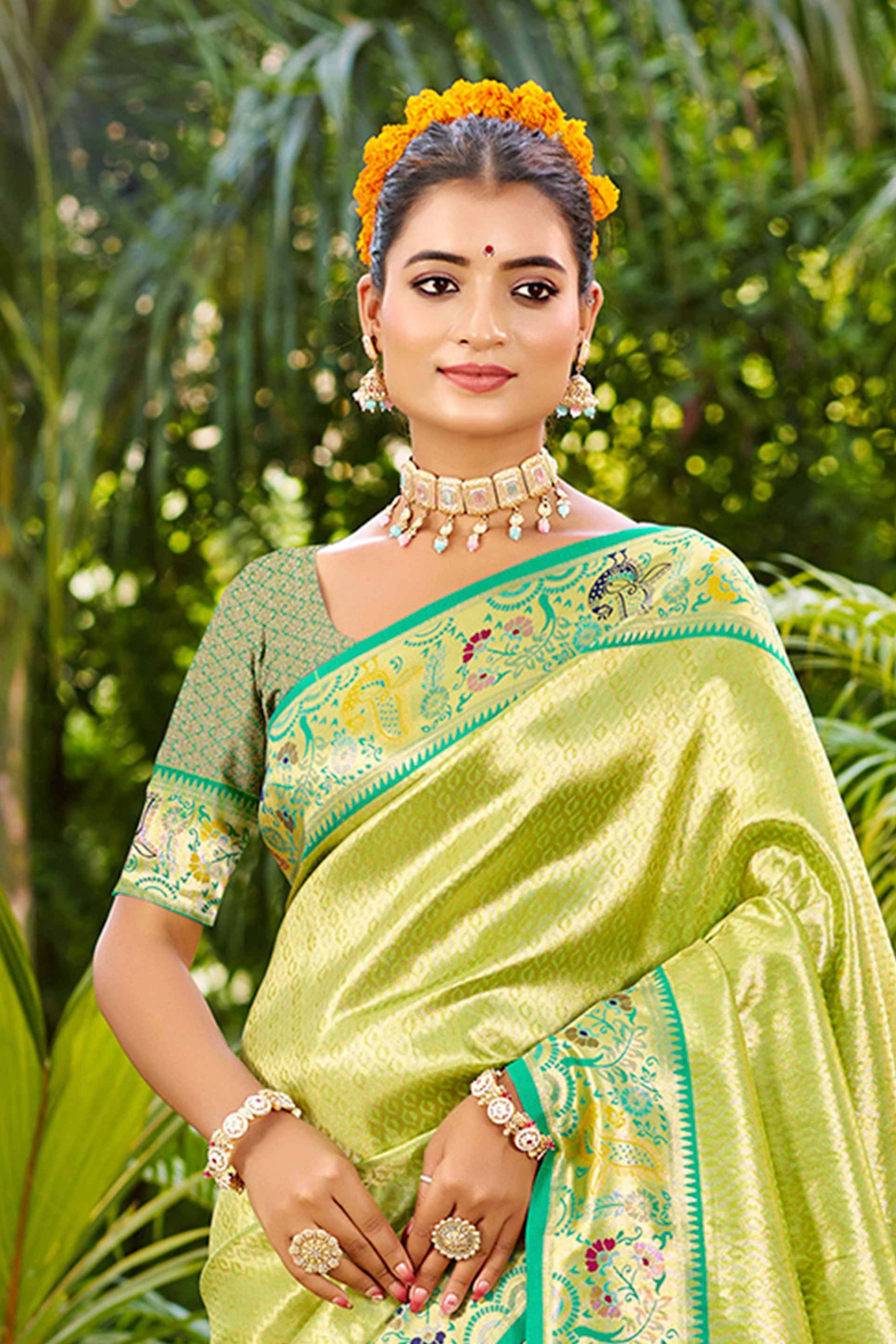 Graceful Green Silk Blend Saree Adorned With Intricate Zari Weave & Peacock Motif Pallu