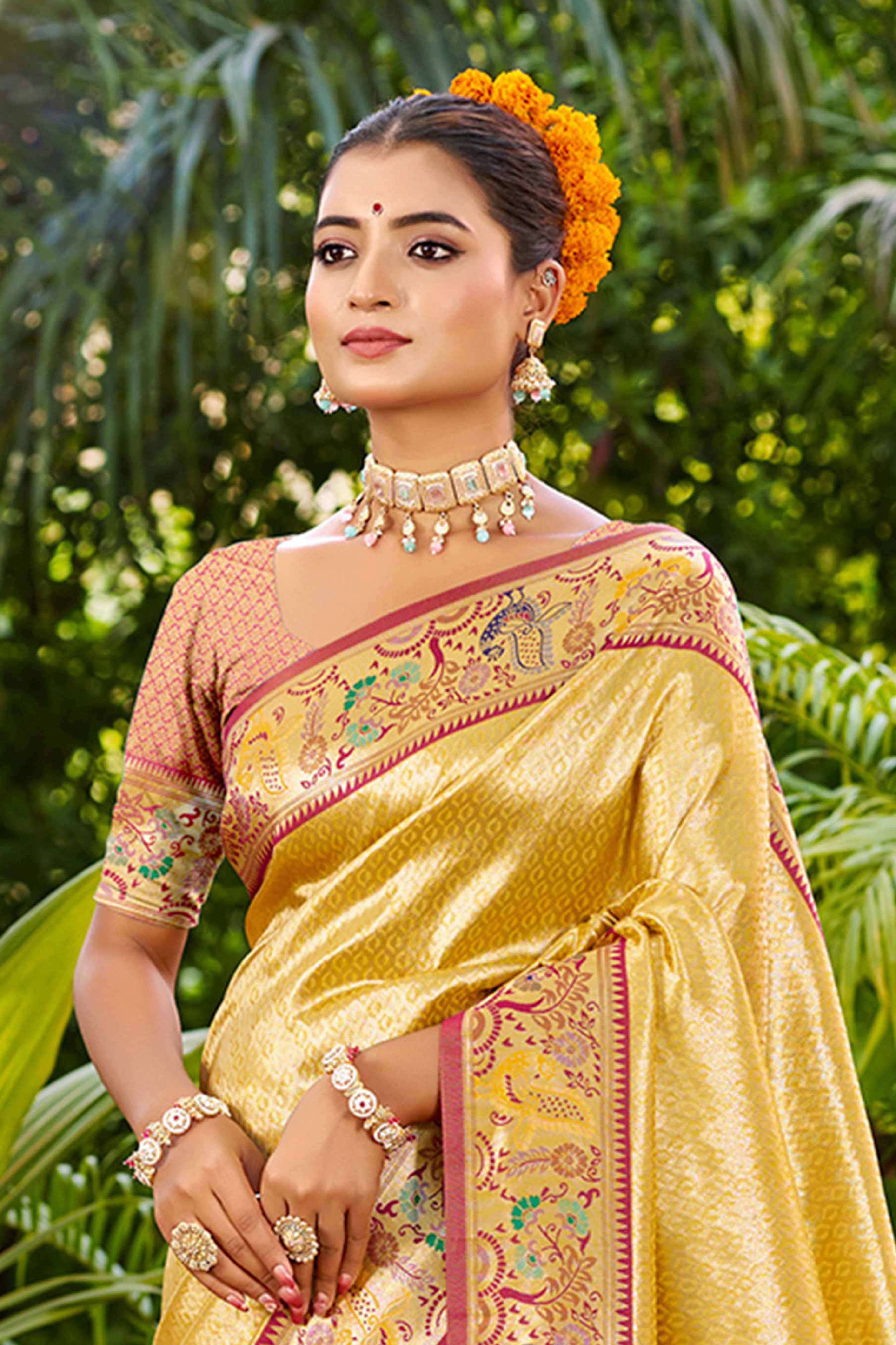 Graceful Yellow Silk Blend Saree Adorned With Intricate Zari Weave & Peacock Motif Pallu