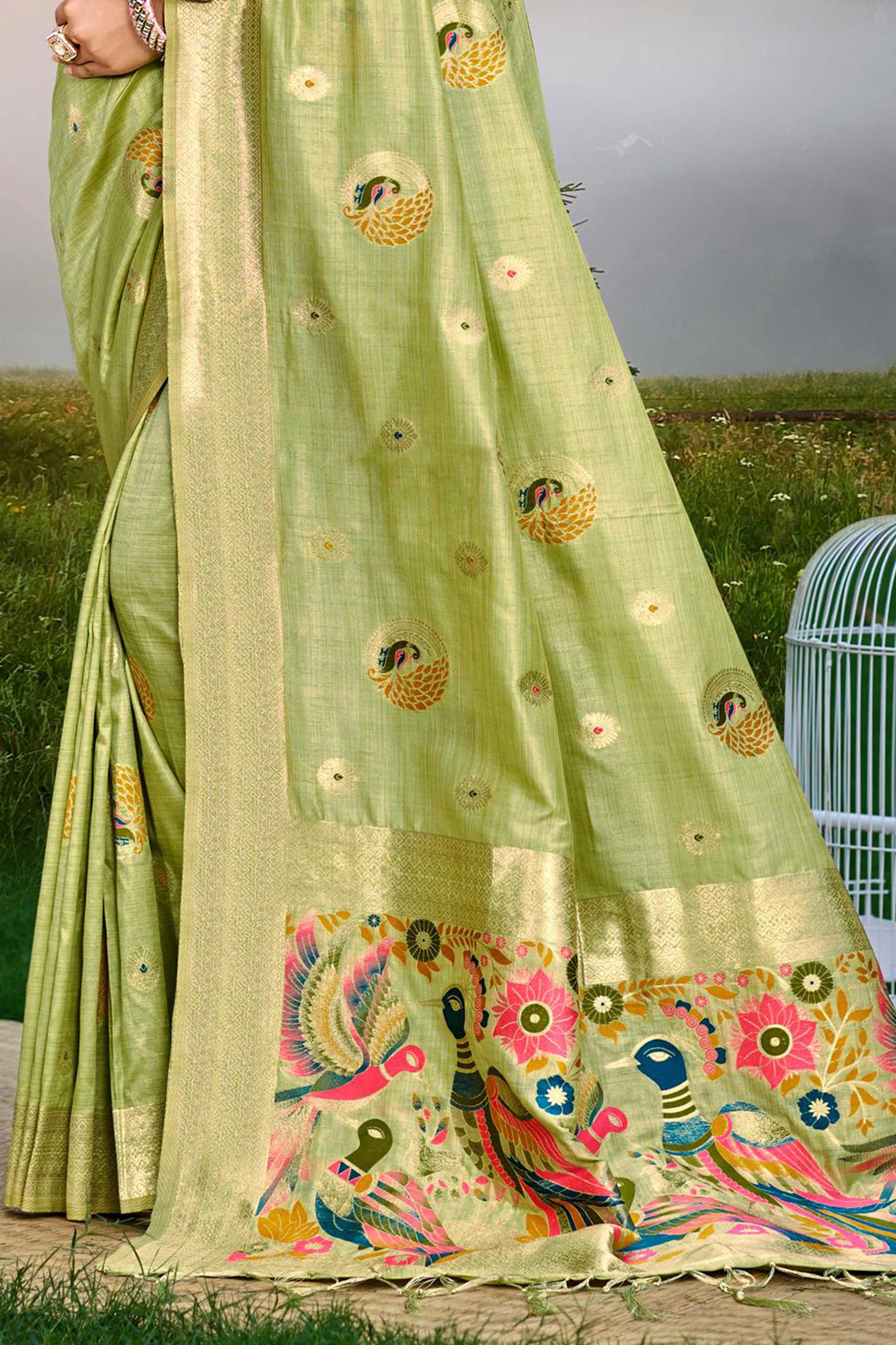 Designer Green Assam Silk Blend Saree Adorned With Peacock Zari Weaving & Tassel Pallu