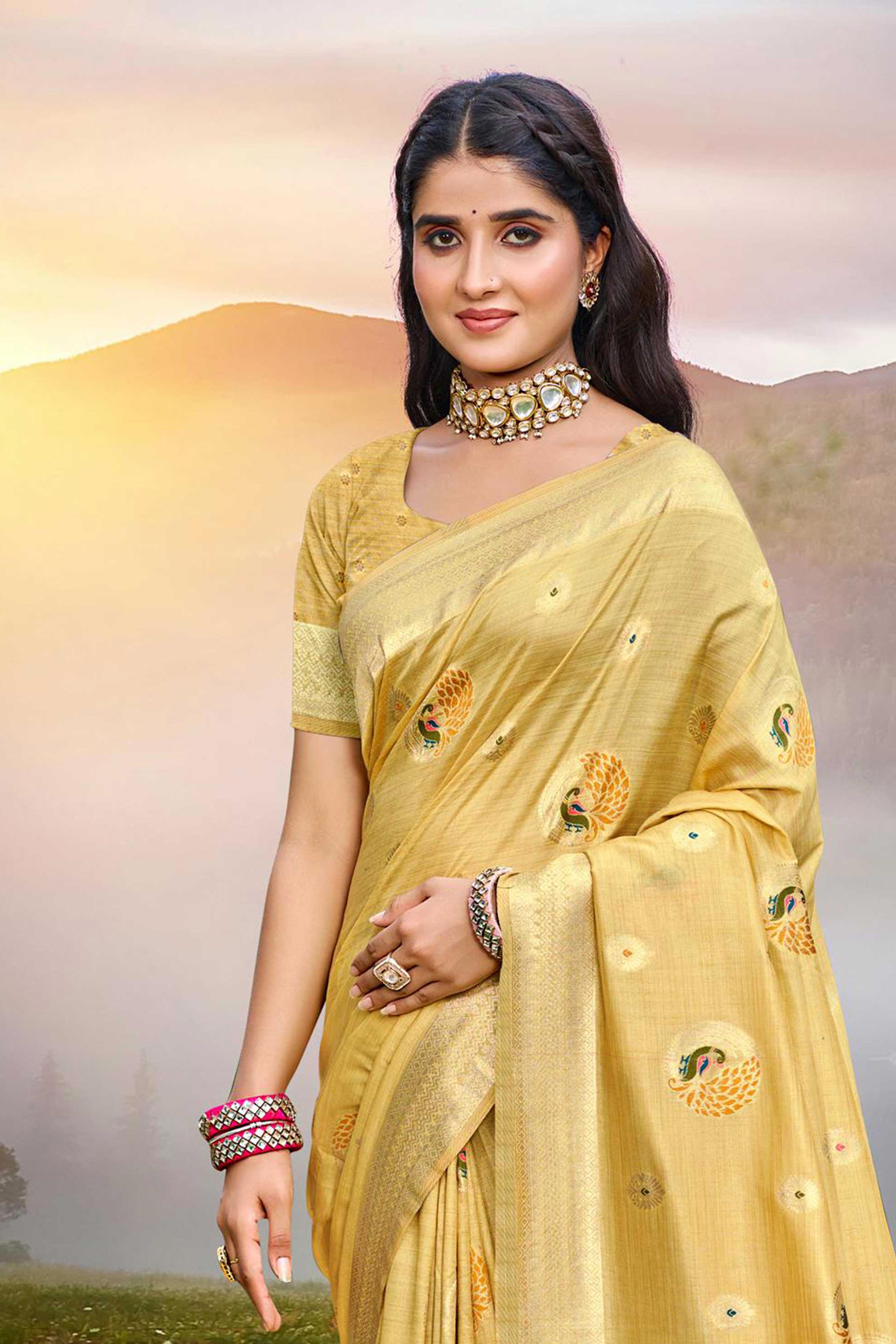 Designer Mustard Assam Silk Blend Saree Adorned With Peacock Zari Weaving & Tassel Pallu