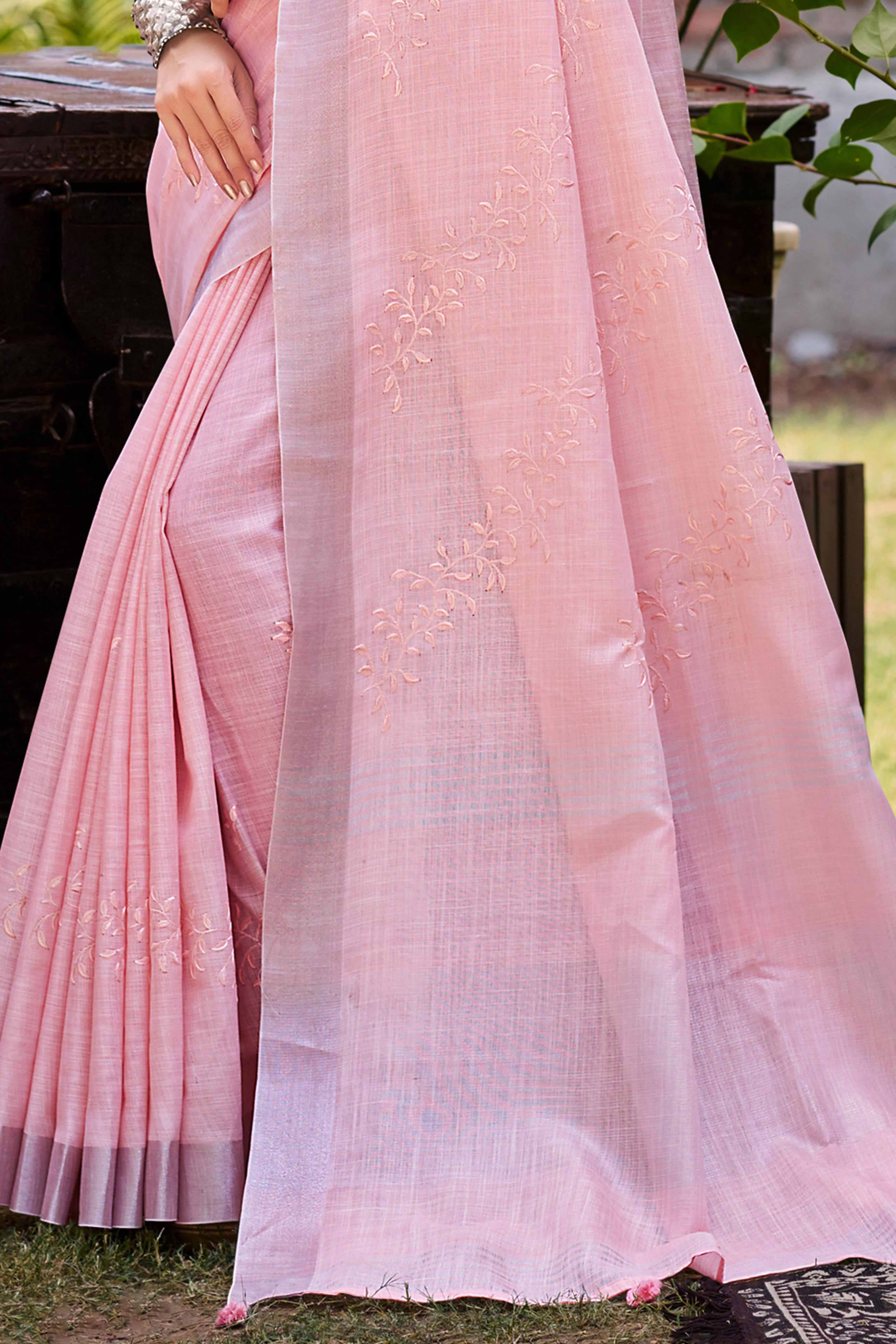 Elegant Pink Linen Saree Featuring Intricate Woven & Embroidered Patterns