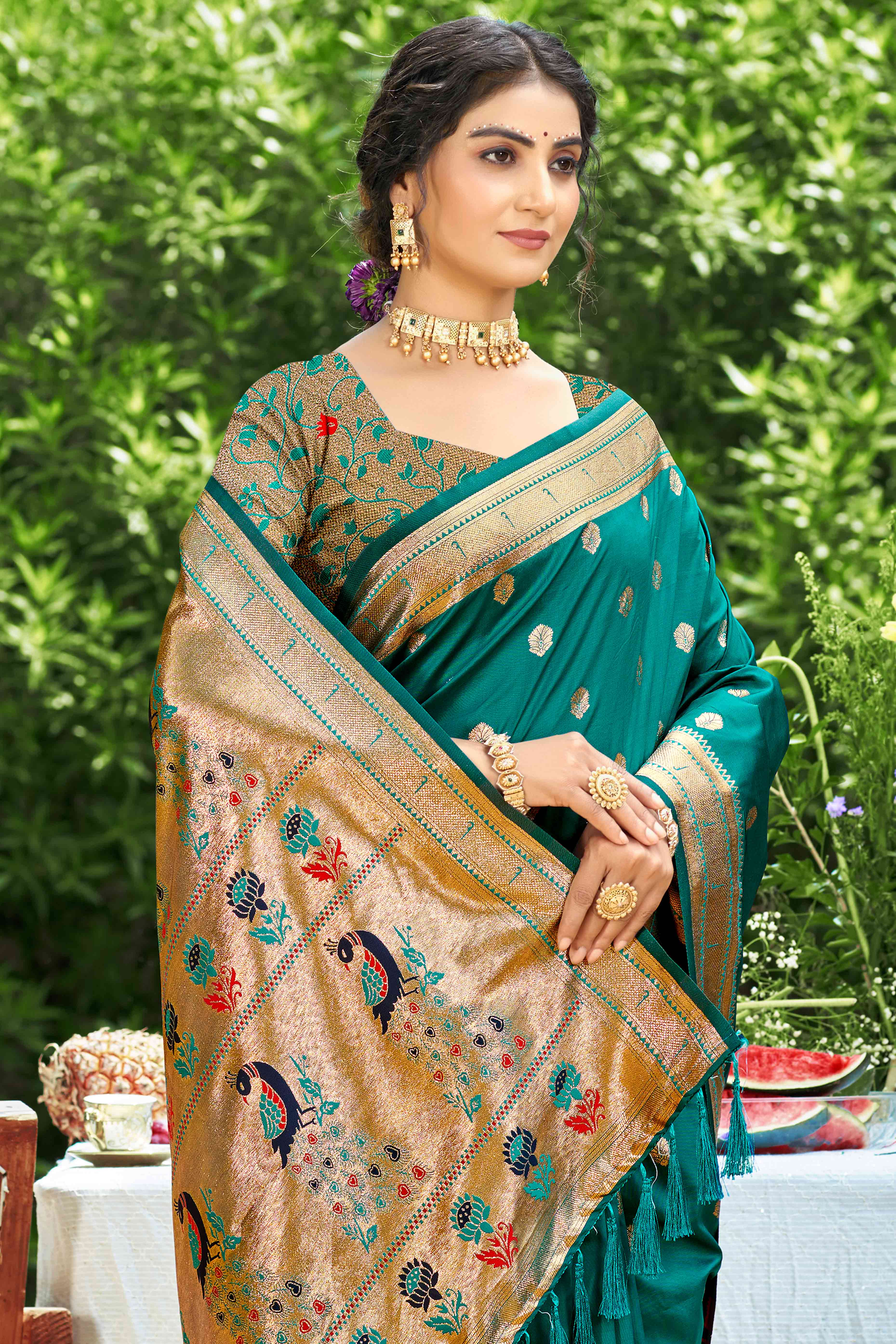 Teal Zari Weaving Silk Blend Saree Adorned With Intricate Peacock Motif Pallu & Graceful Tassel