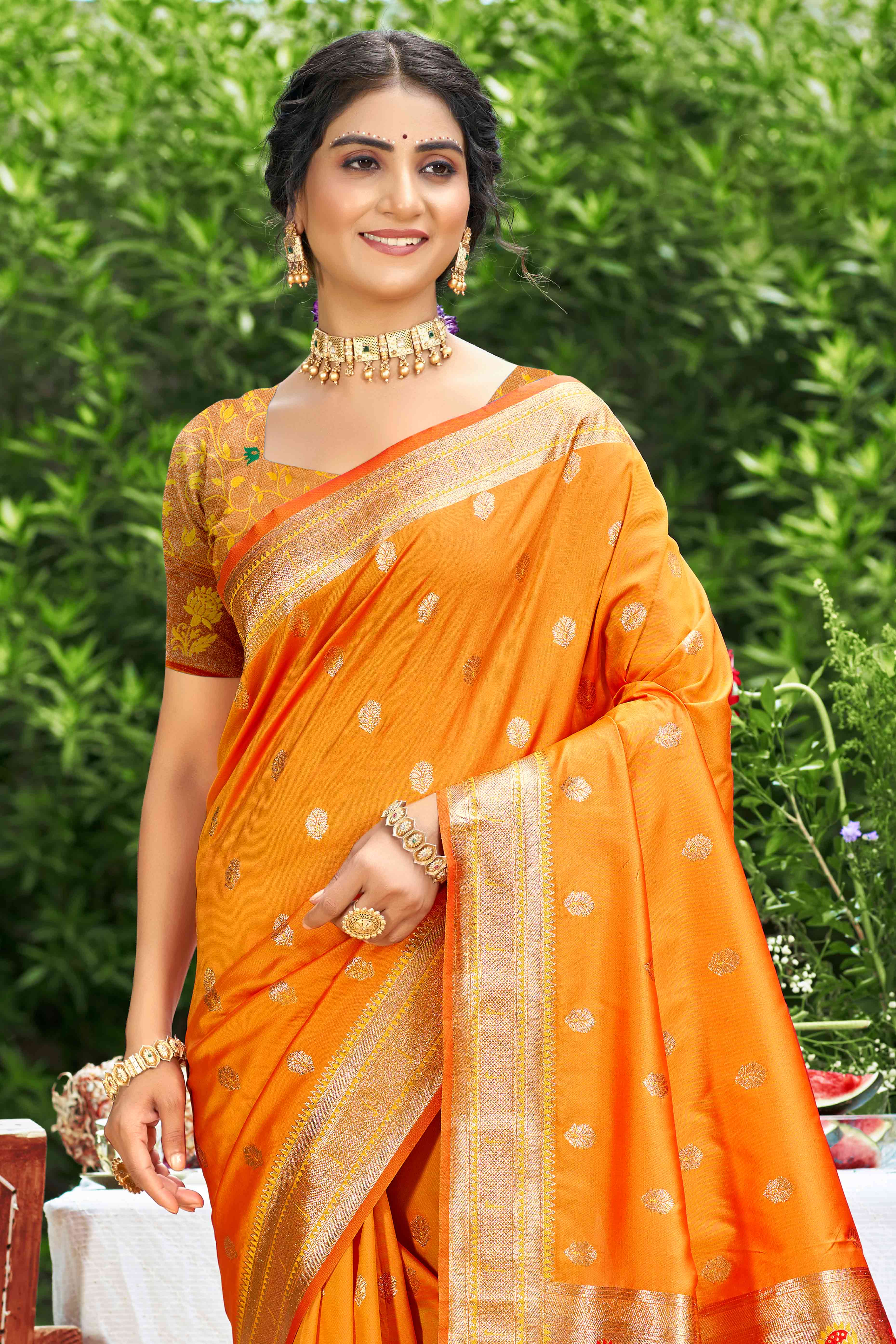 Orange Zari Weaving Silk Blend Saree Adorned With Intricate Peacock Motif Pallu & Graceful Tassel