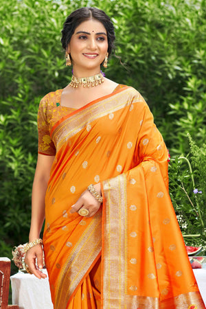 Orange Zari Weaving Silk Blend Saree Adorned With Intricate Peacock Motif Pallu & Graceful Tassel