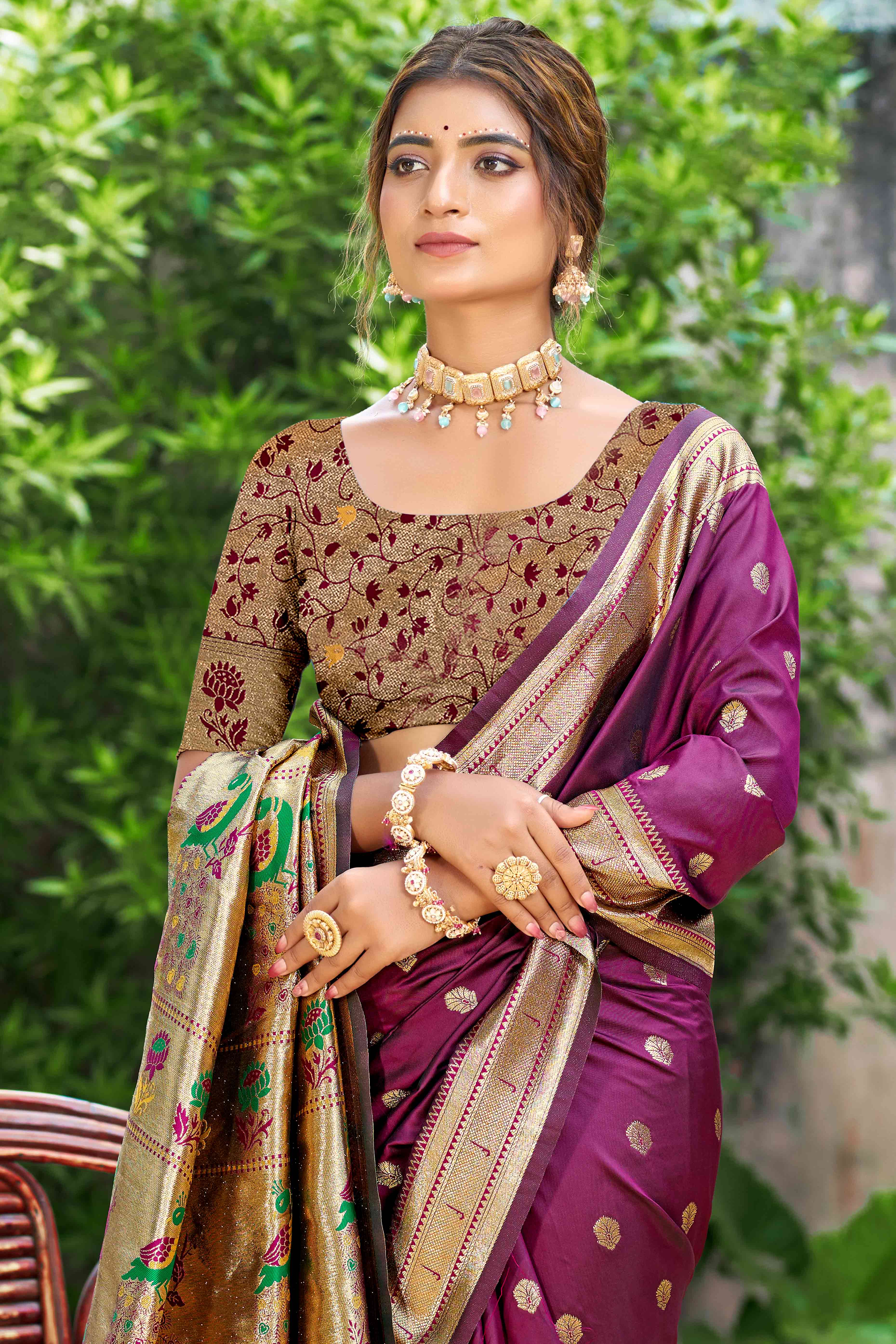 Wine Zari Weaving Silk Blend Saree Adorned With Intricate Peacock Motif Pallu & Graceful Tassel