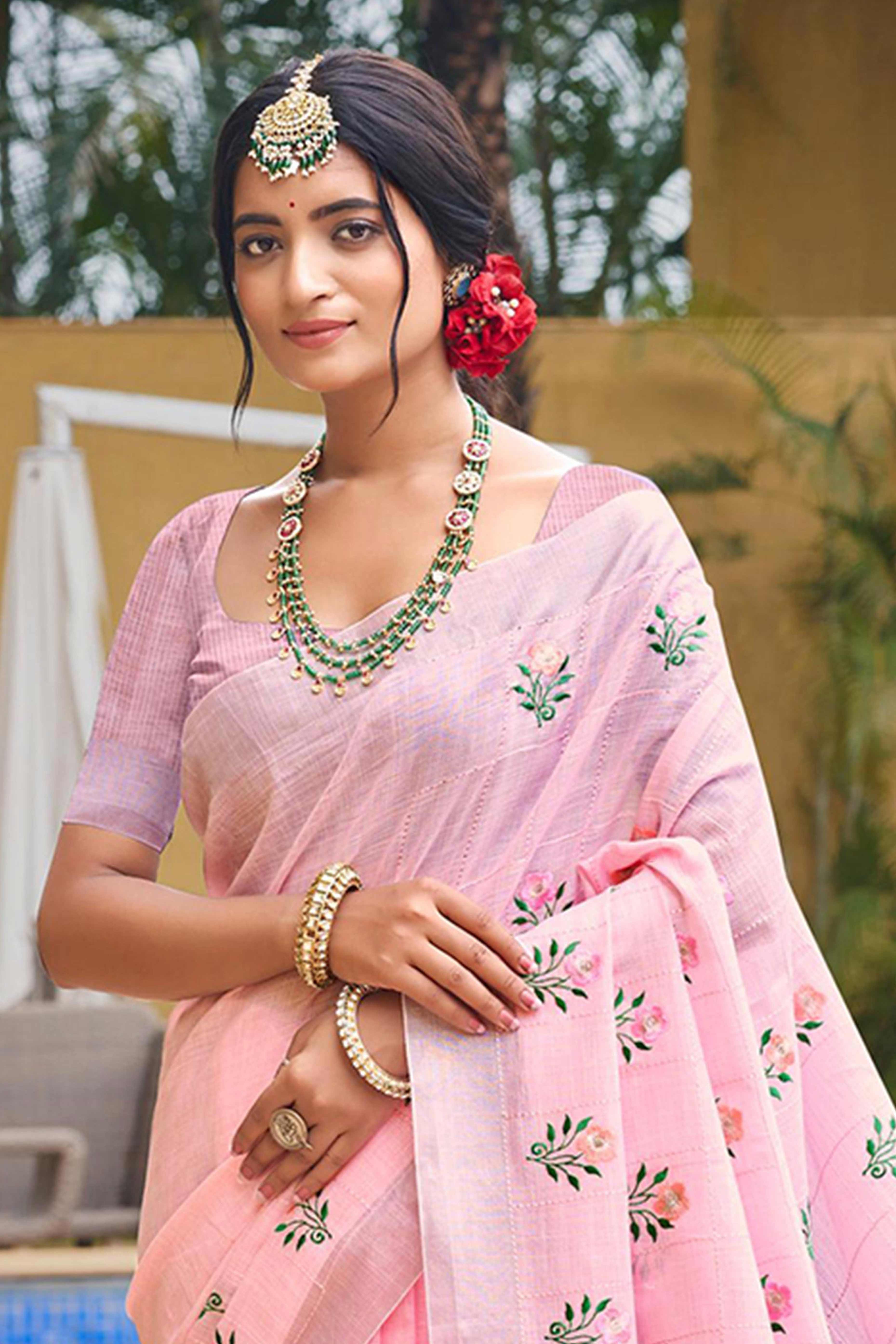 Captivating Pastel Pink Floral Thread Embroidered Linen Saree With Elegant Weaving Border