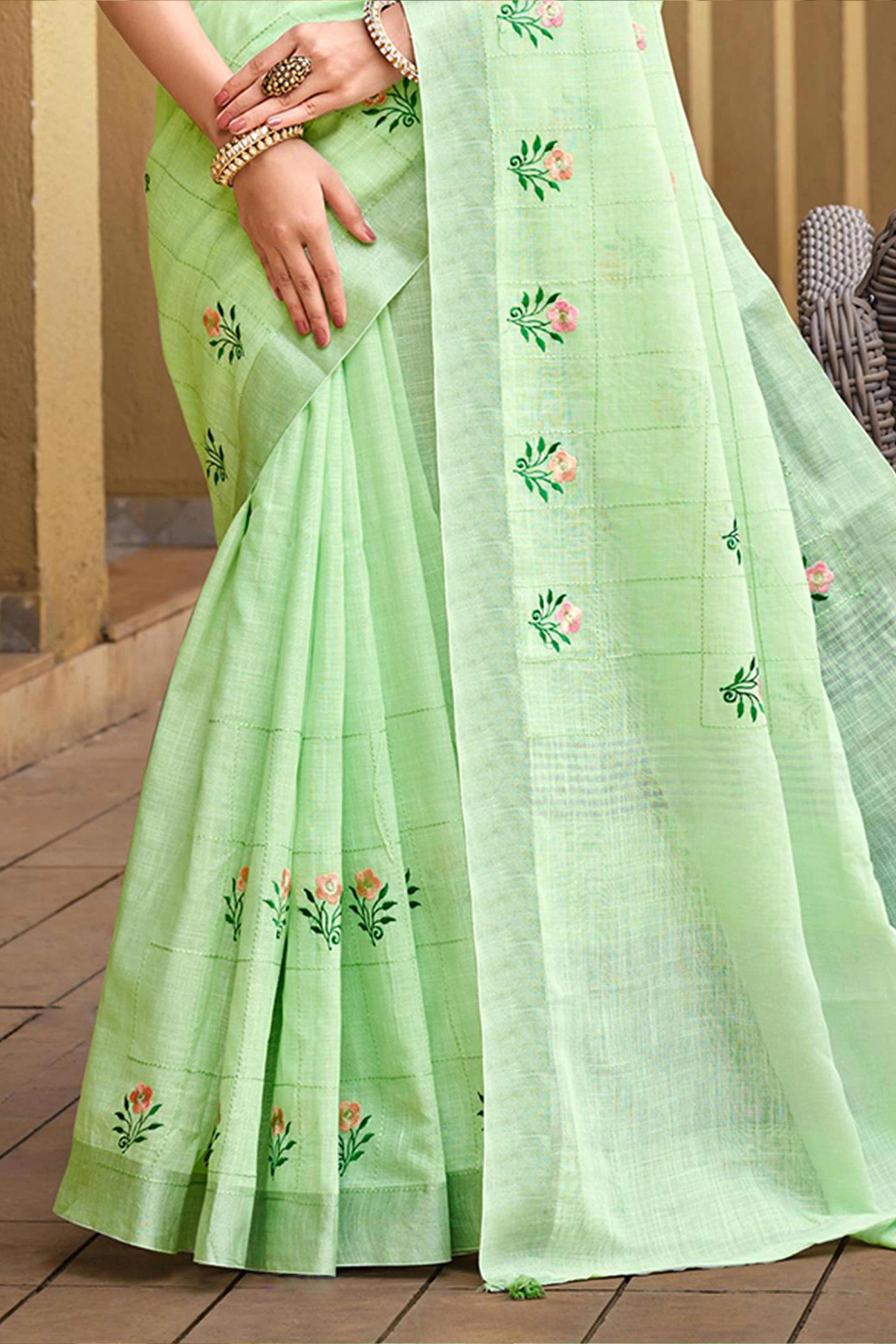 Captivating Green Floral Thread Embroidered Linen Saree With Elegant Weaving Border