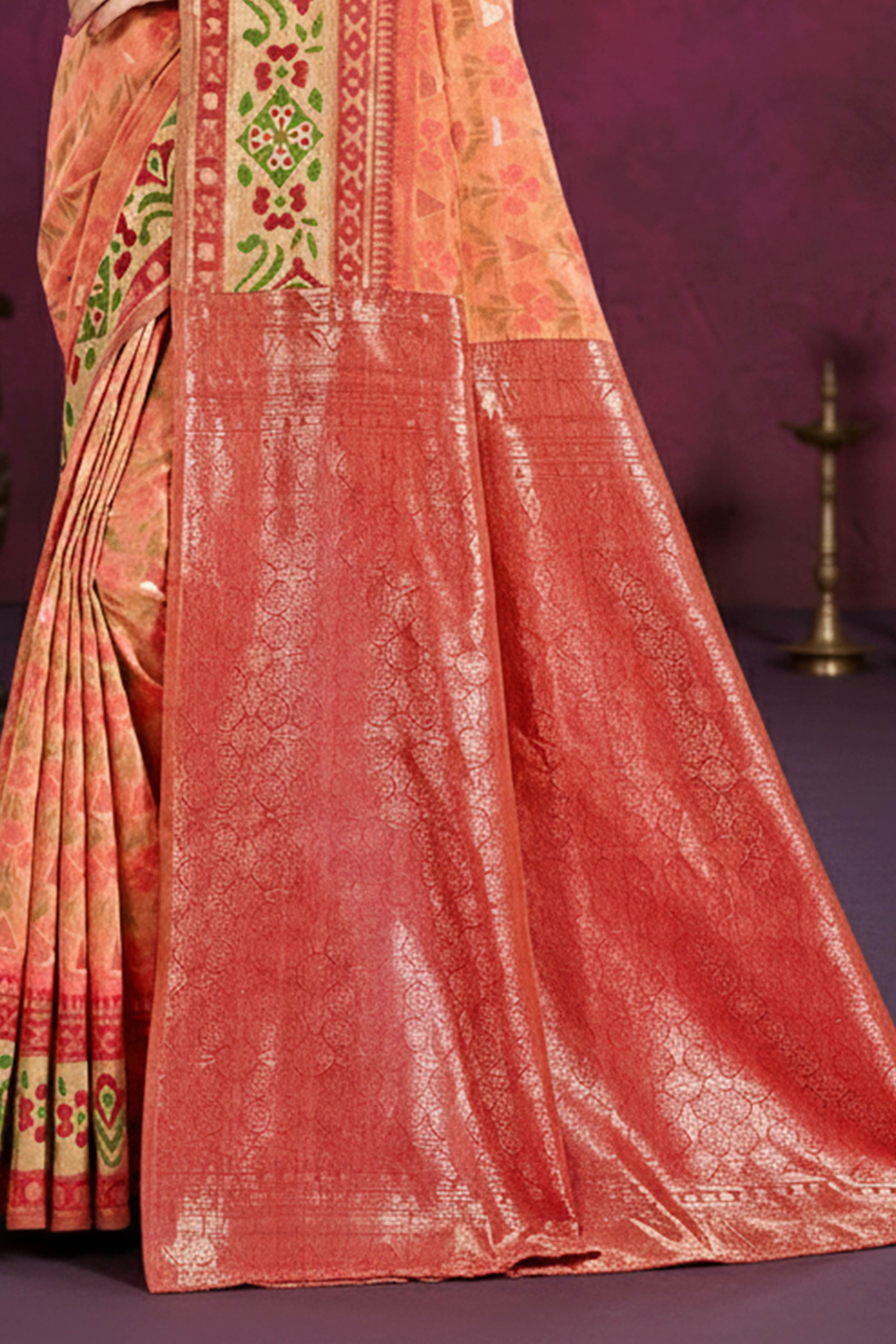 Designer Light Orange Cotton Silk Saree Showcasing Delicate Floral Weaving & Tassel Pallu