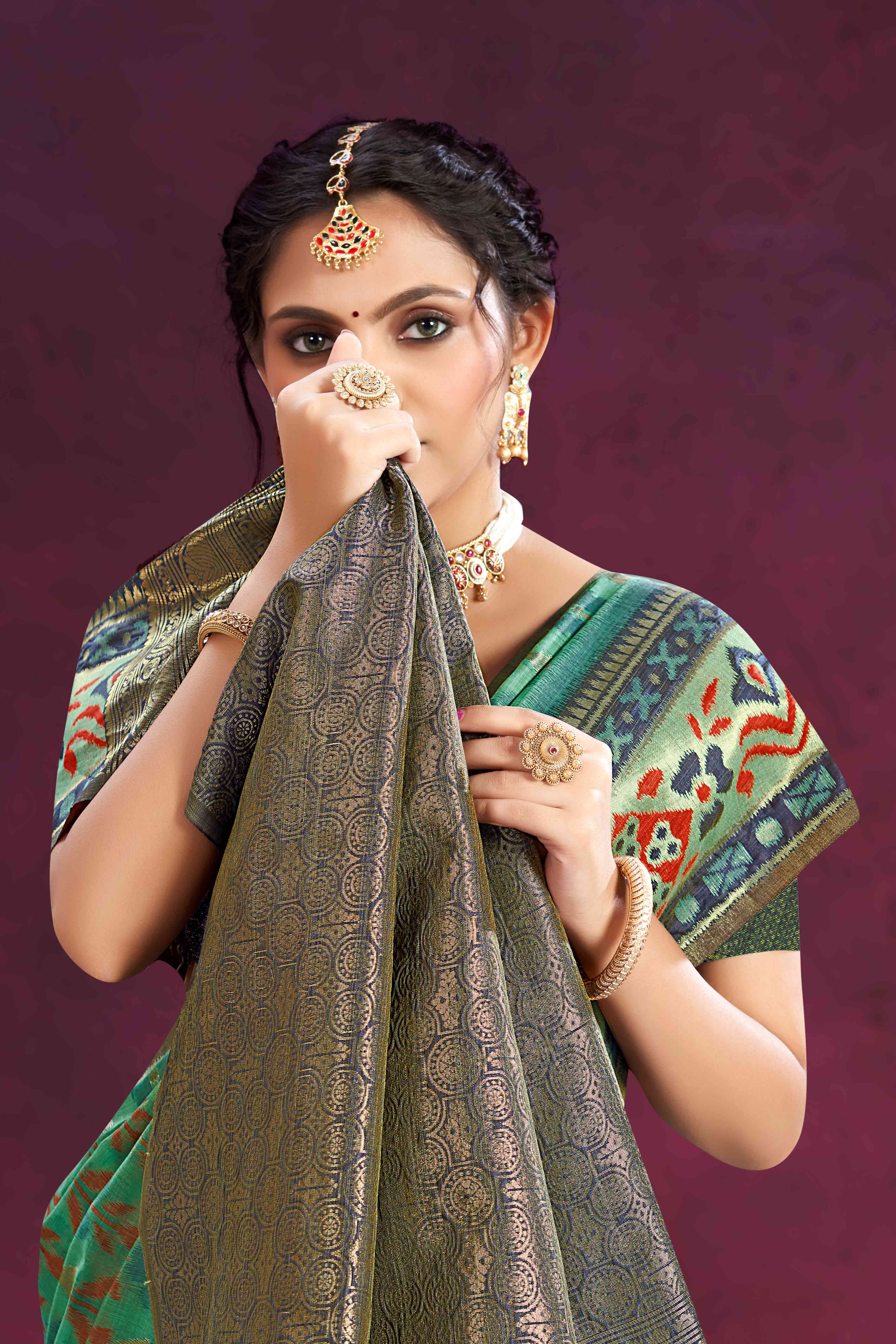 Designer Turquoise Cotton Silk Saree Showcasing Delicate Floral Weaving & Tassel Pallu