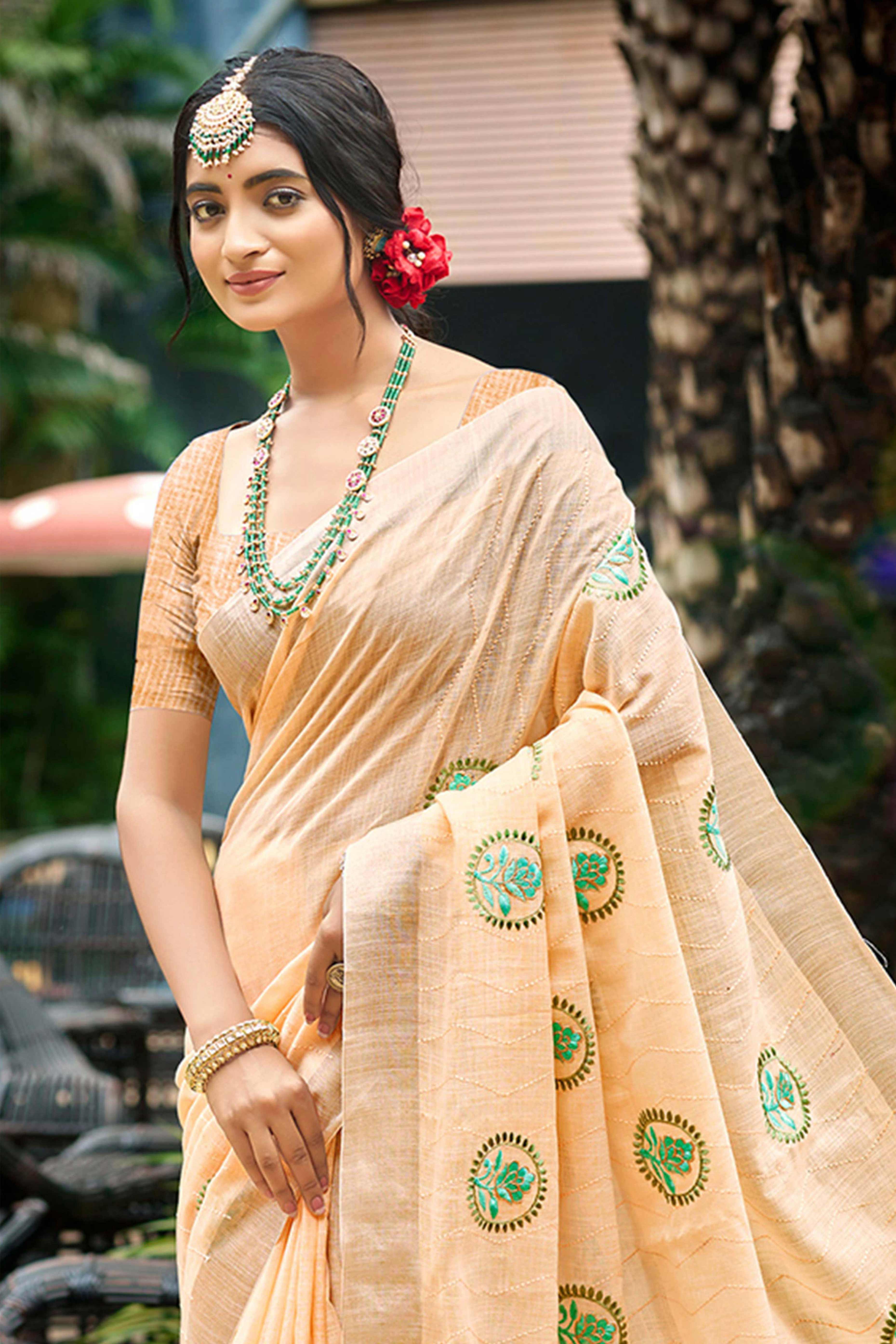 Premium Light Peach Floral Embroidered Linen Saree With Striped Pattern Tassel Pallu