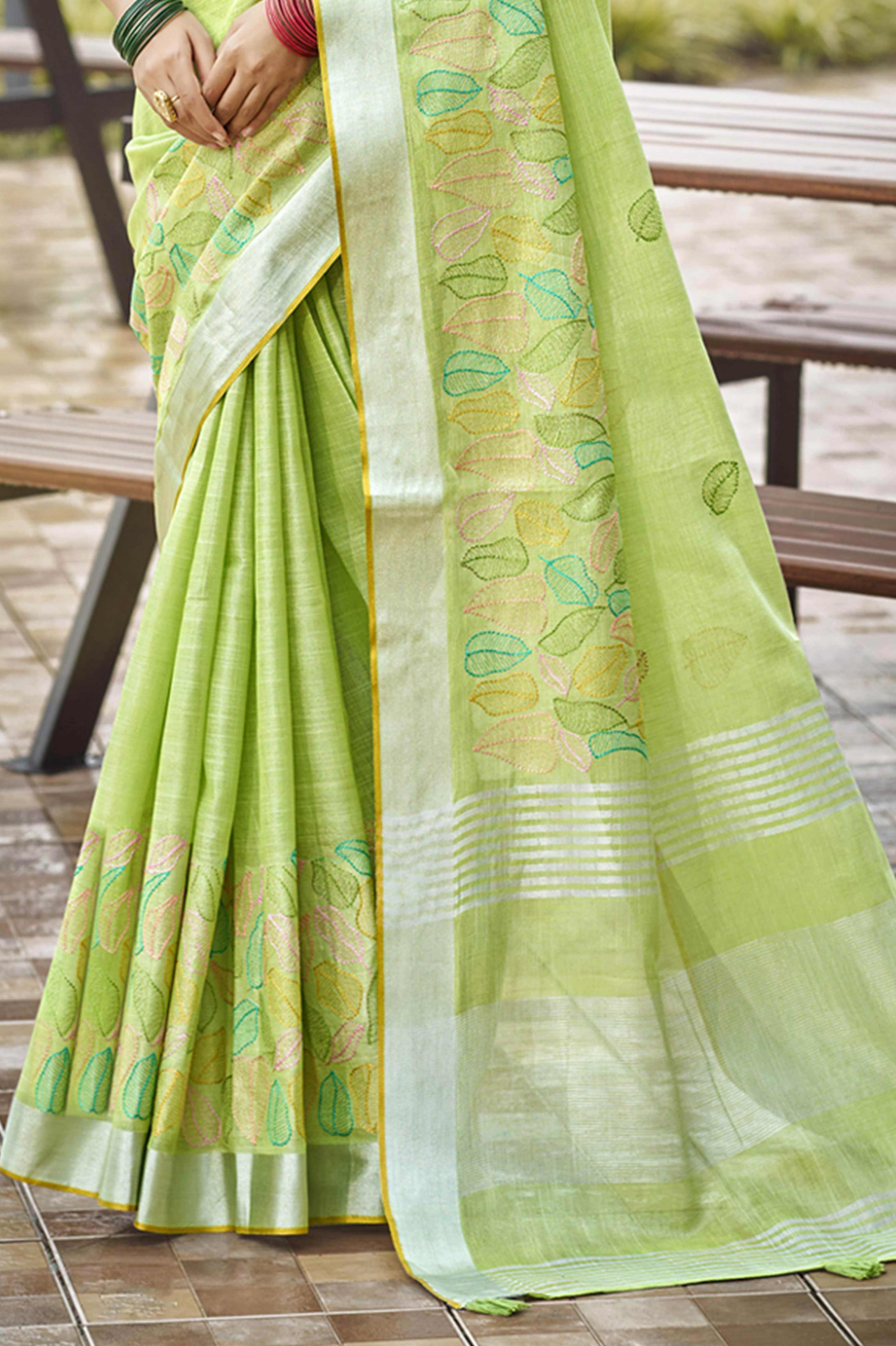 Classic Green Leaf Pattern Thread Embroidery Work Linen Saree With Tassel Pallu