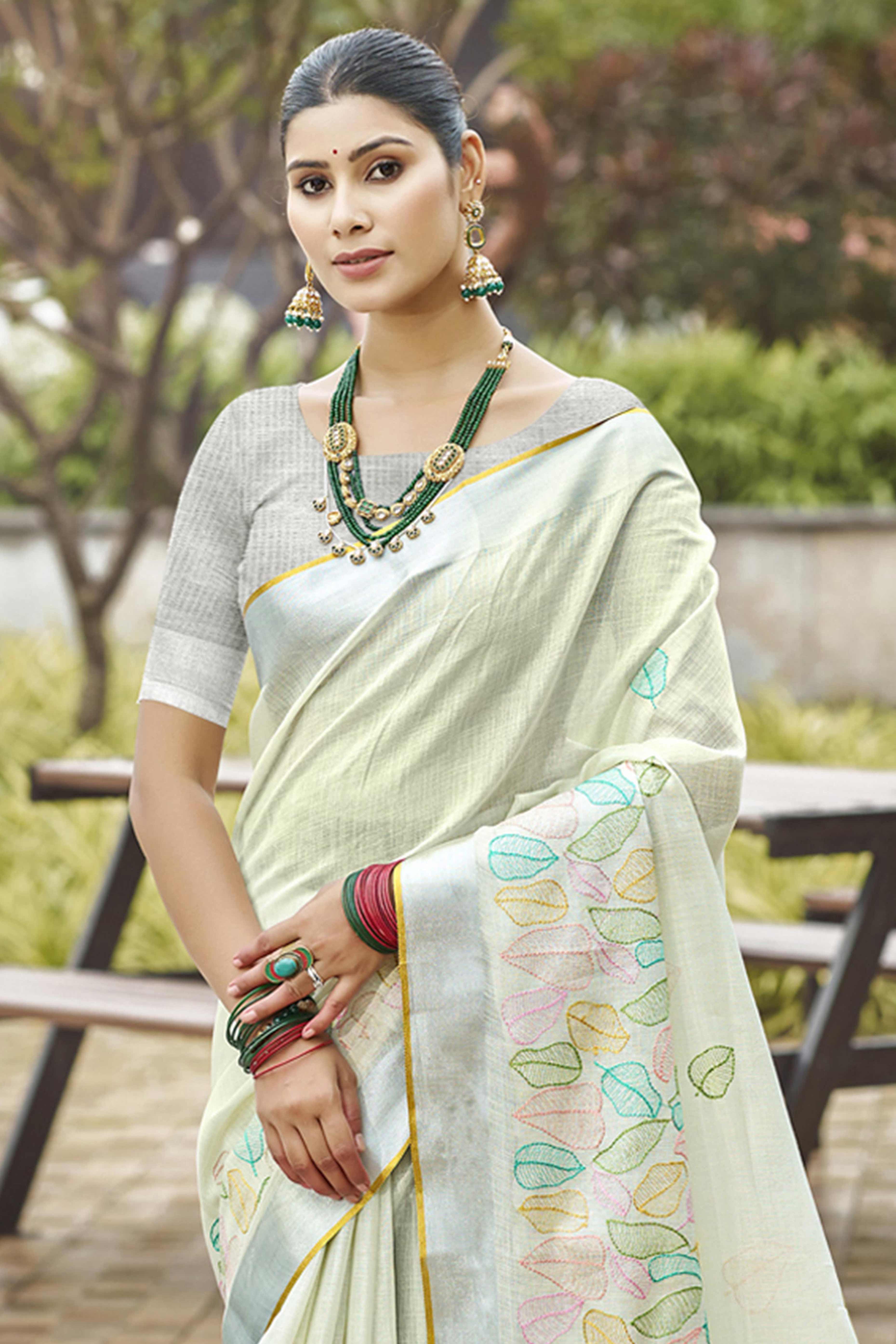 Classic Offwhite Leaf Pattern Thread Embroidery Work Linen Saree With Tassel Pallu