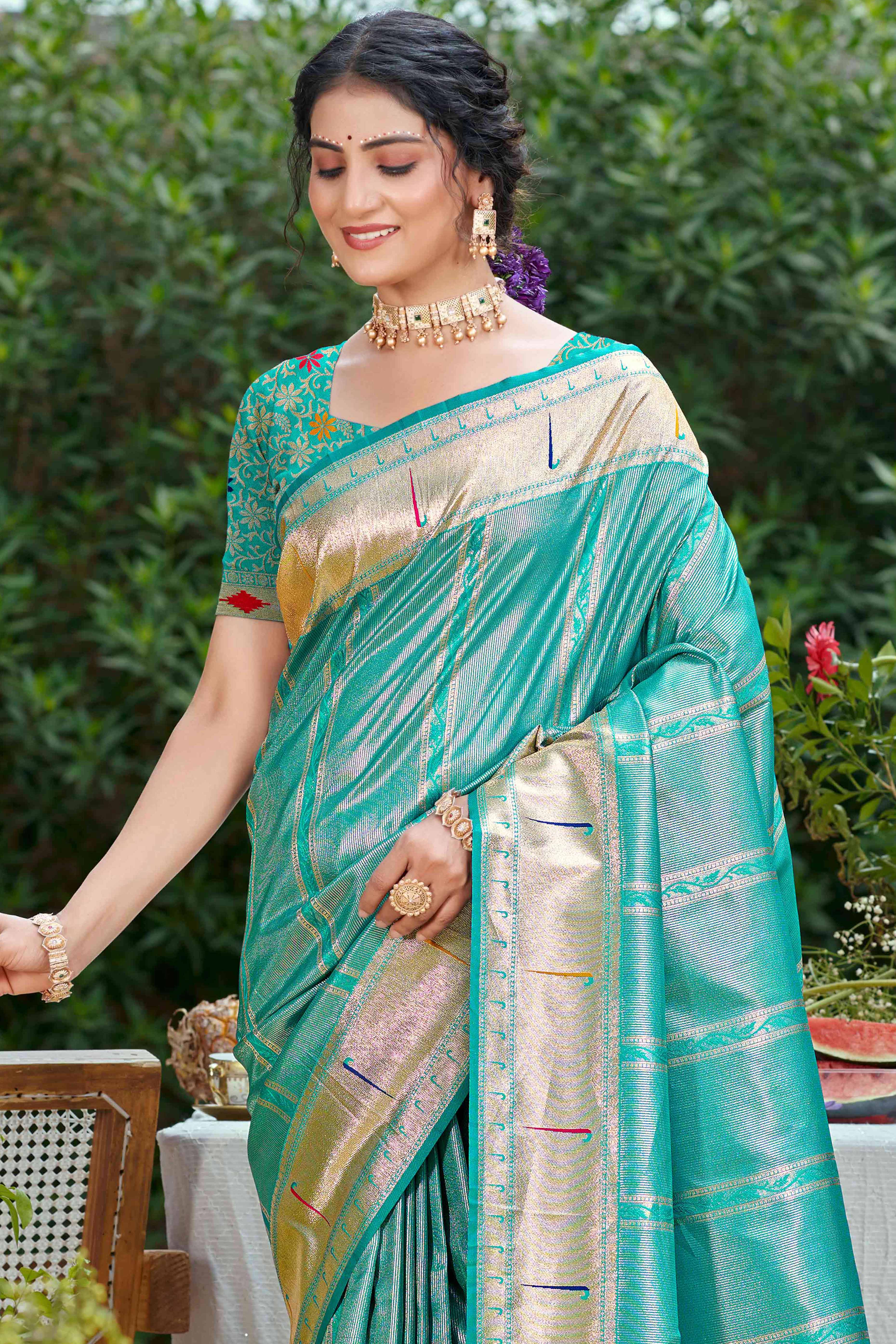 Turquoise Designer Weaving Silk Blend Saree Accented With Graceful Peacock & Floral Motif Pallu