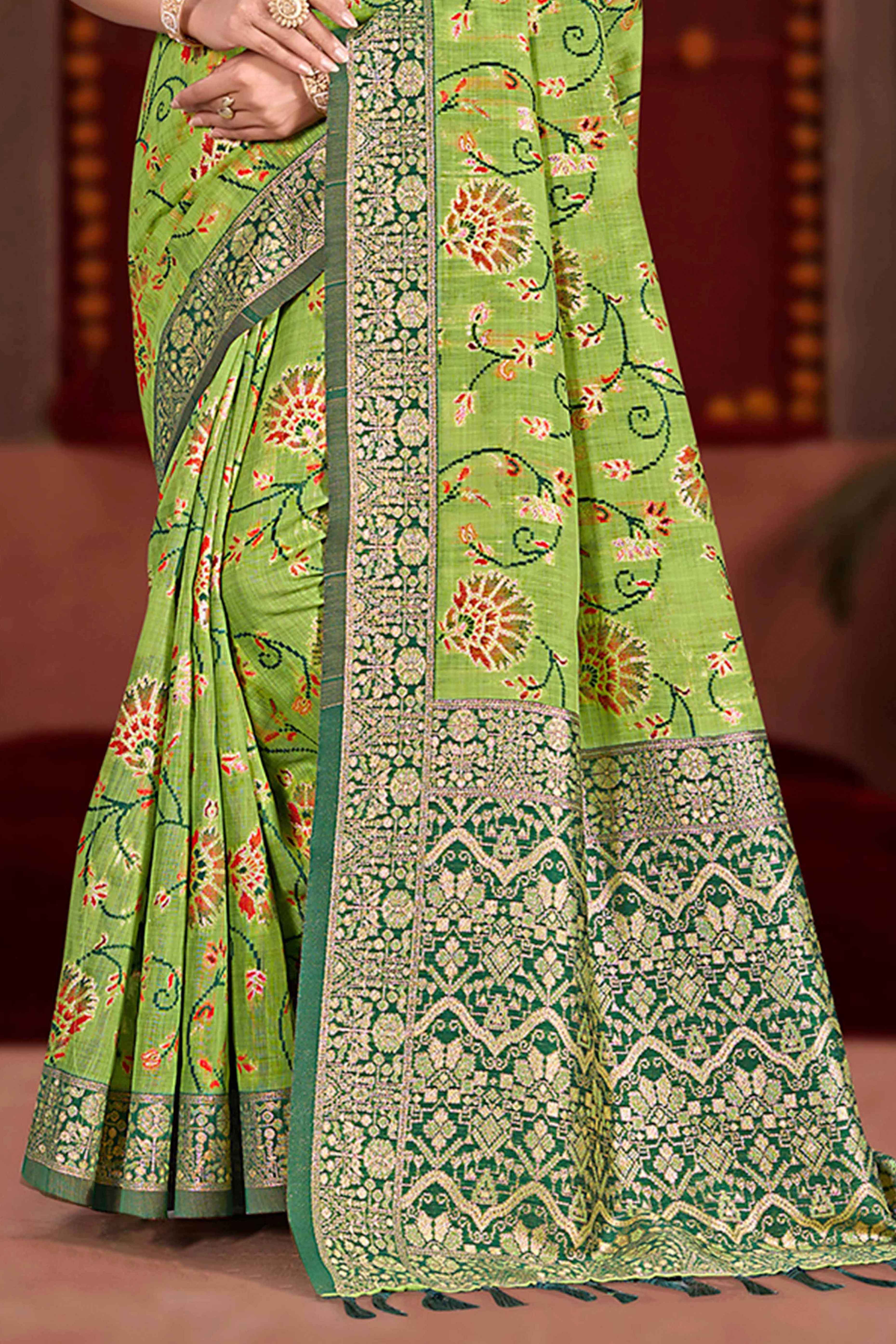 Elegant Green Cotton Silk Saree Adorned With Floral Weaving & Graceful Tassel Pallu