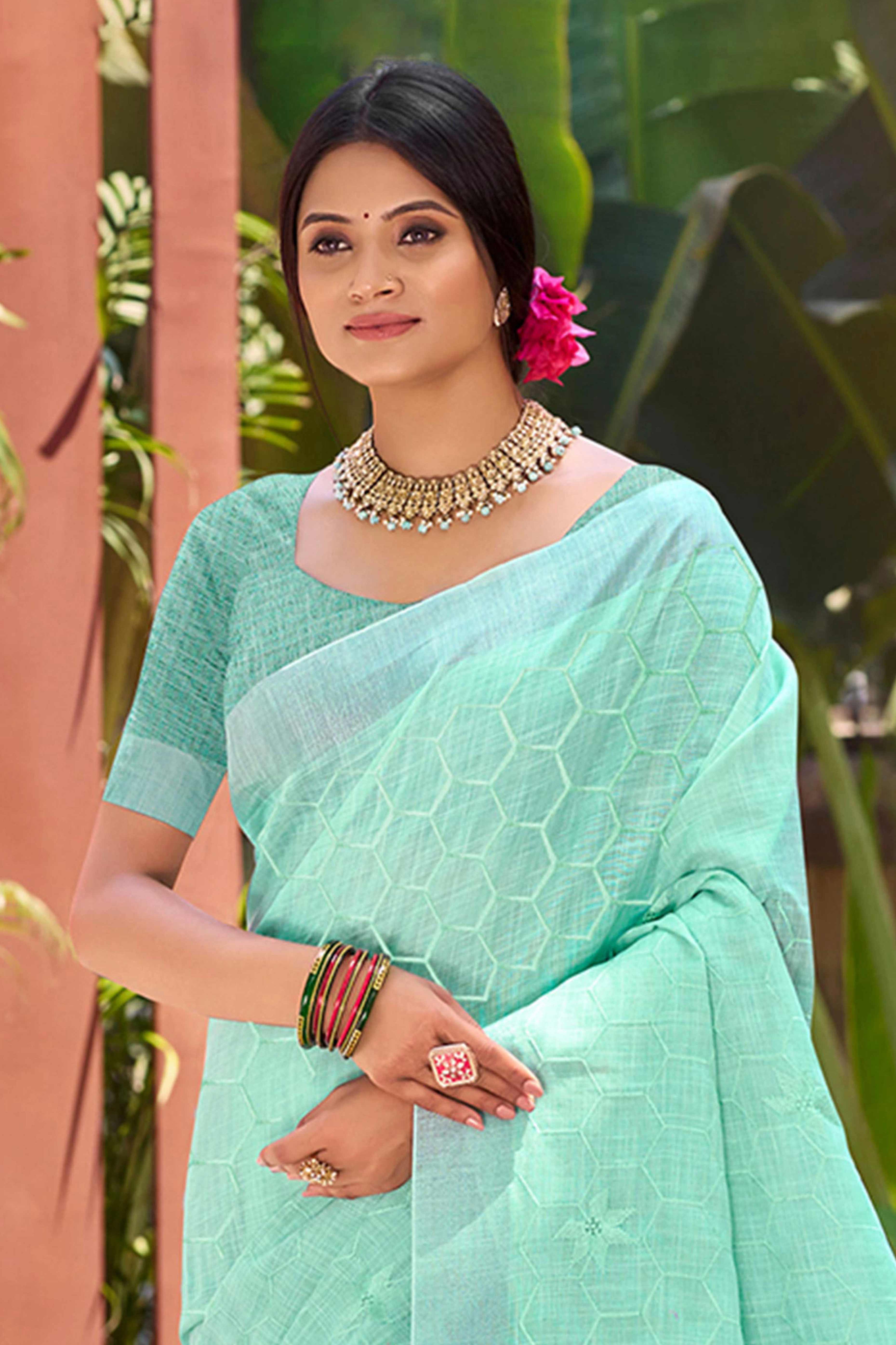Turquoise Classic Linen Saree Enhanced With Fine Geometric Embroidery Work & Tassel Pallu
