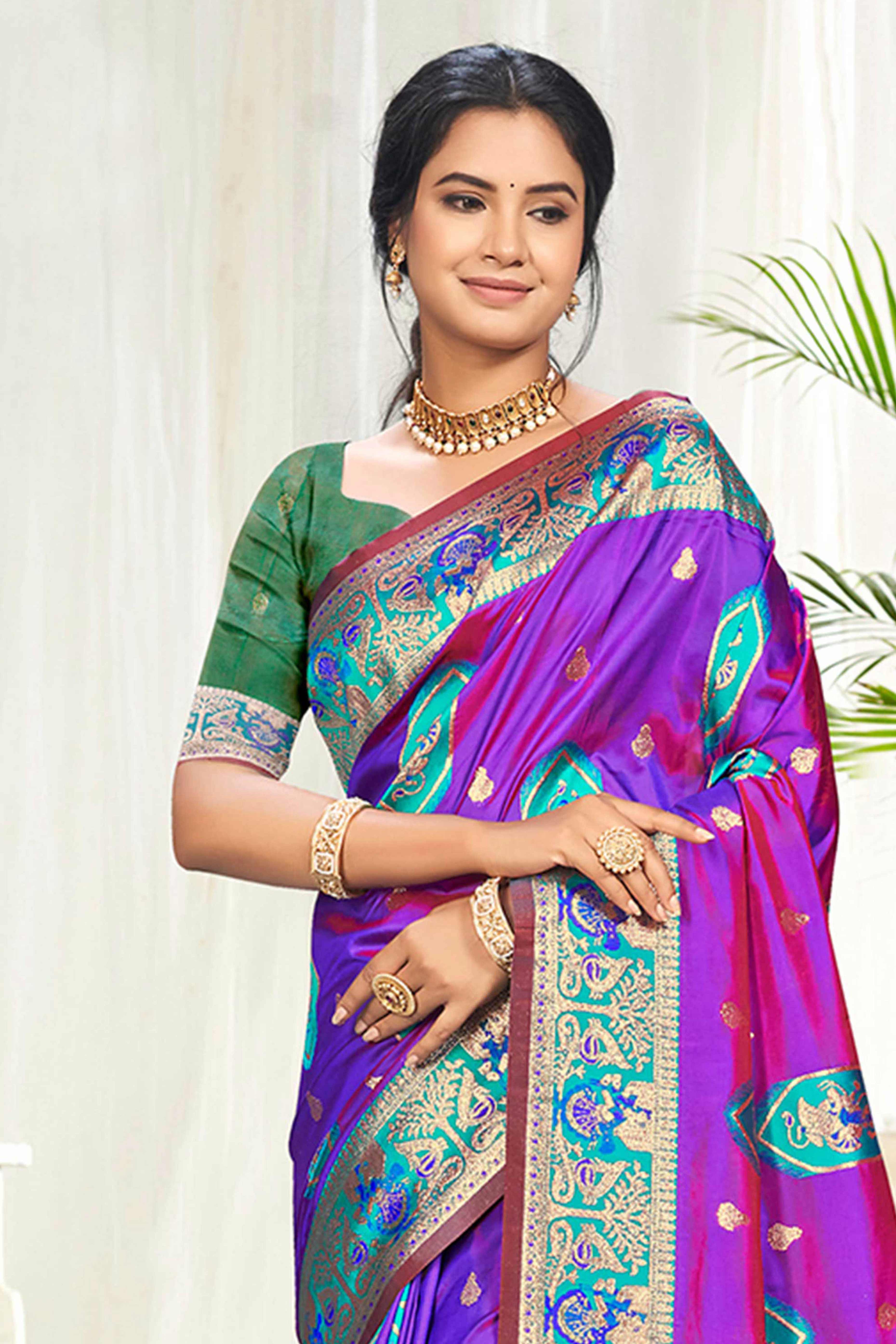 Mesmerizing Purple Traditional style Weaving Silk Blend Saree With Graceful Tassel Pallu