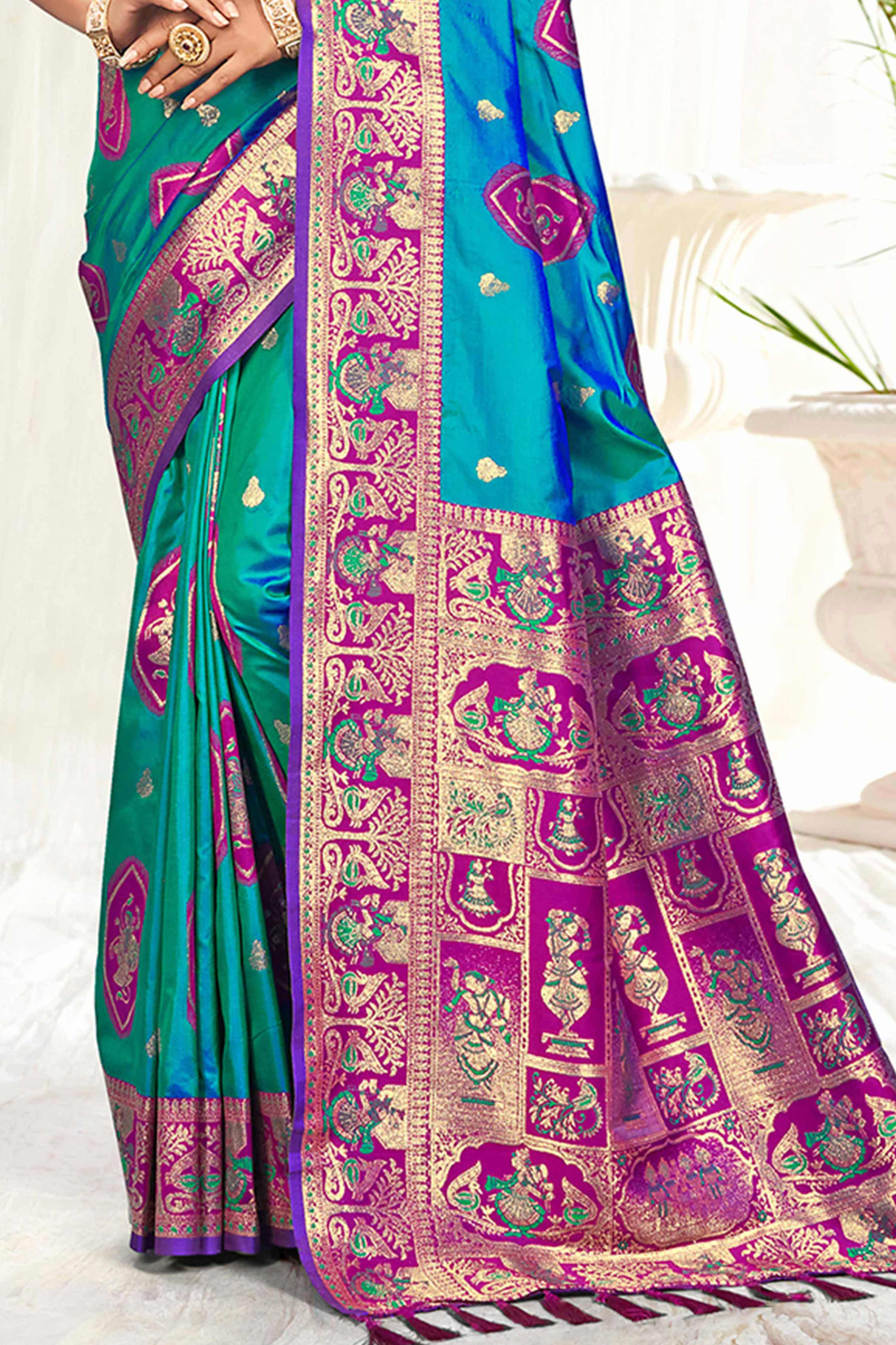 Mesmerizing Morpich Blue Traditional style Weaving Silk Blend Saree With Graceful Tassel Pallu