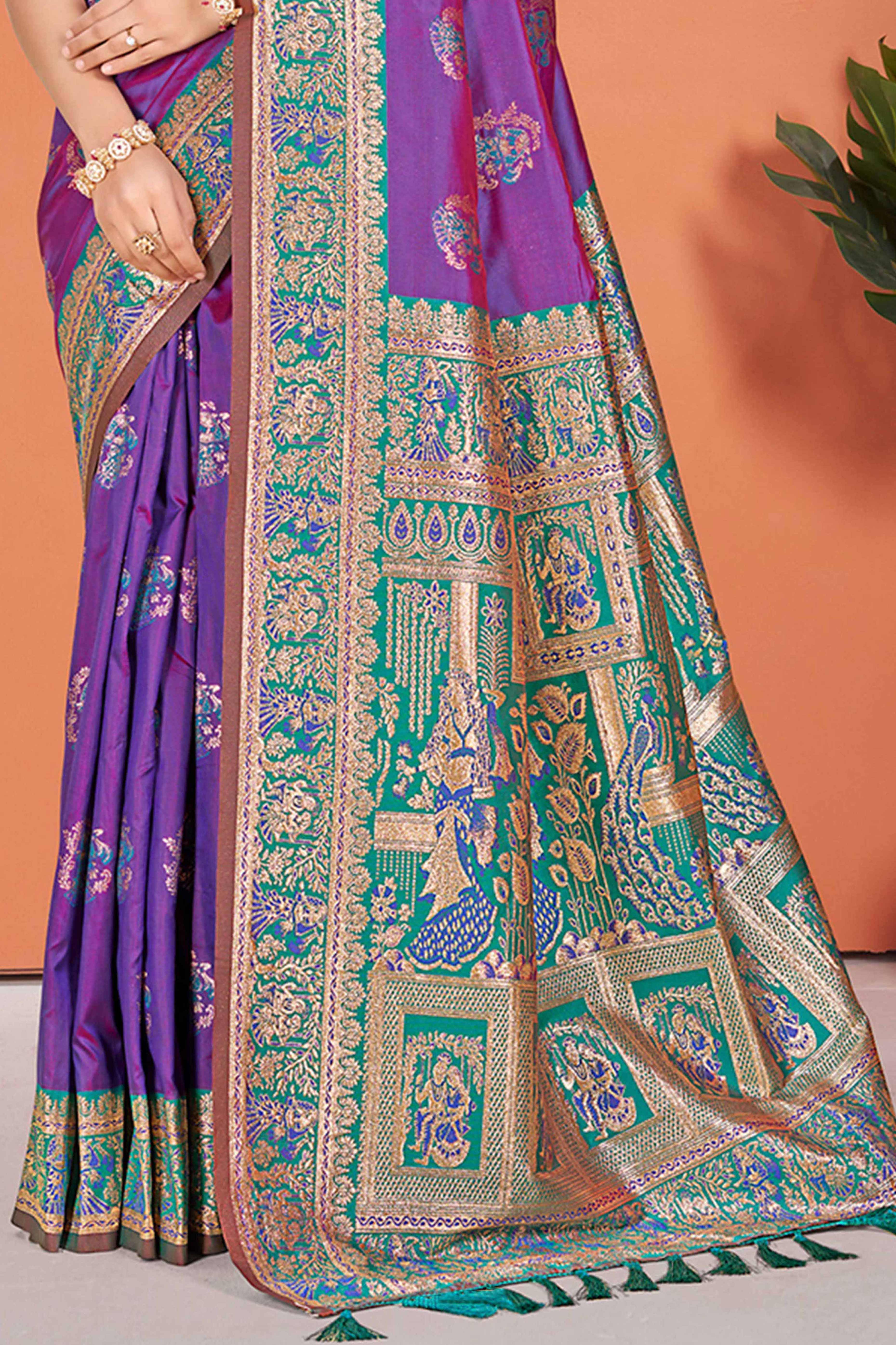 Purple Traditional Zari Weaving Silk Blend Saree Accented With Tassel Pallu