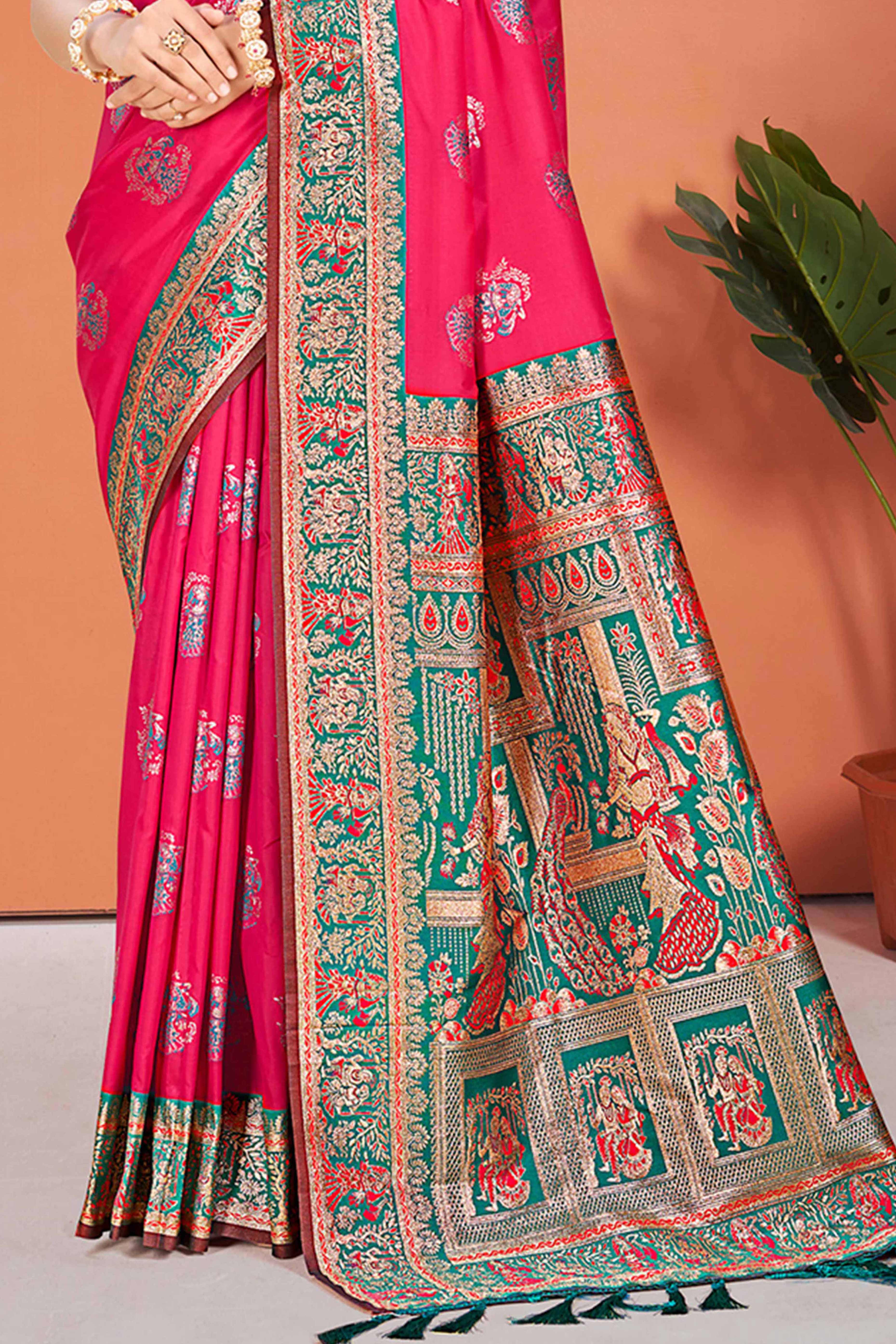 Pink Traditional Zari Weaving Silk Blend Saree Accented With Tassel Pallu