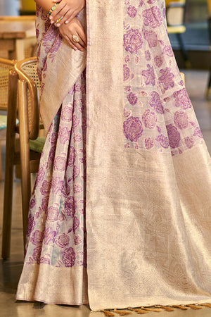 Purple Premium Cotton Silk Saree Highlighted With Floral Weaving Work & Tassel Pallu