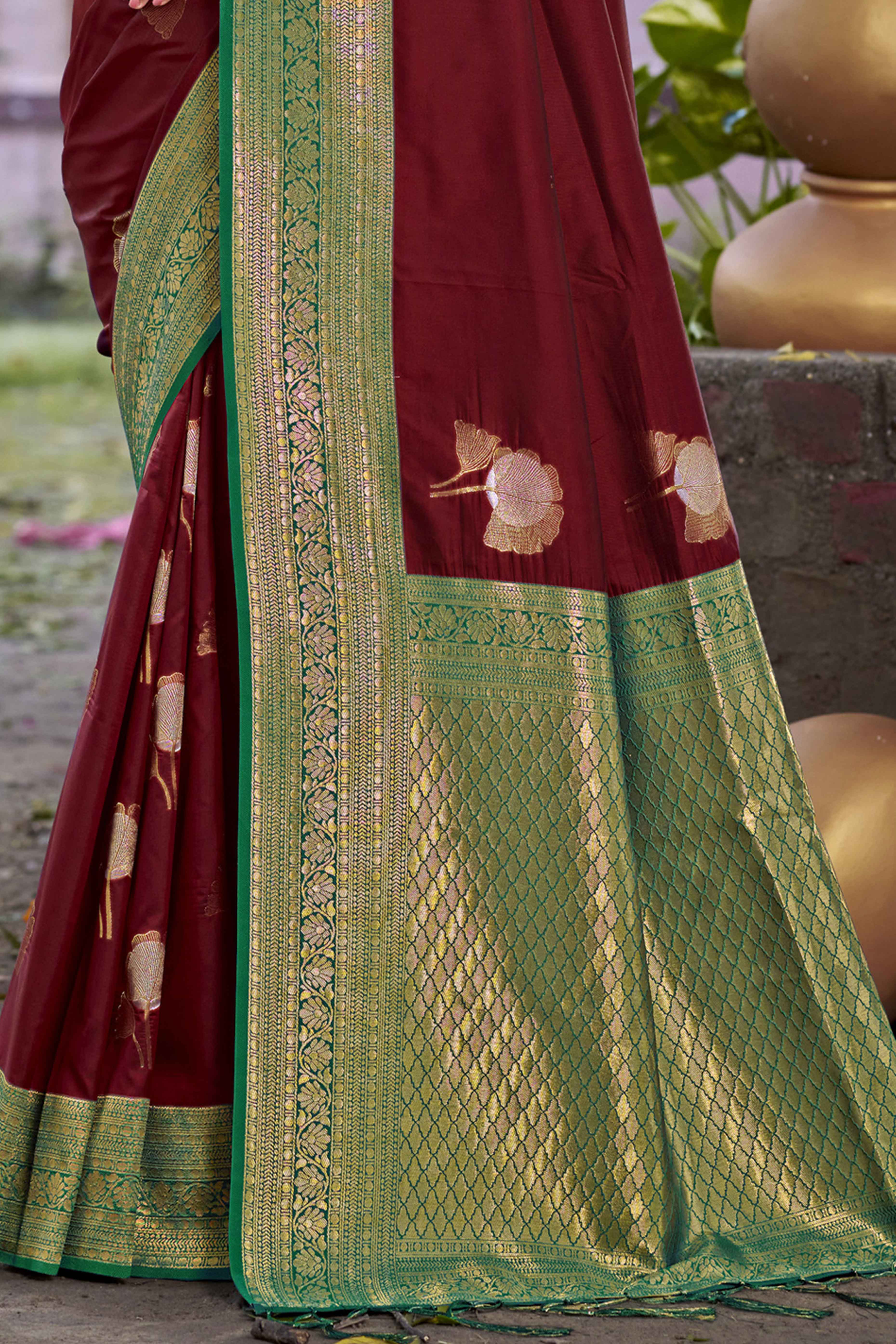 Maroon Floral Woven Banarasi Silk Saree With Tassels